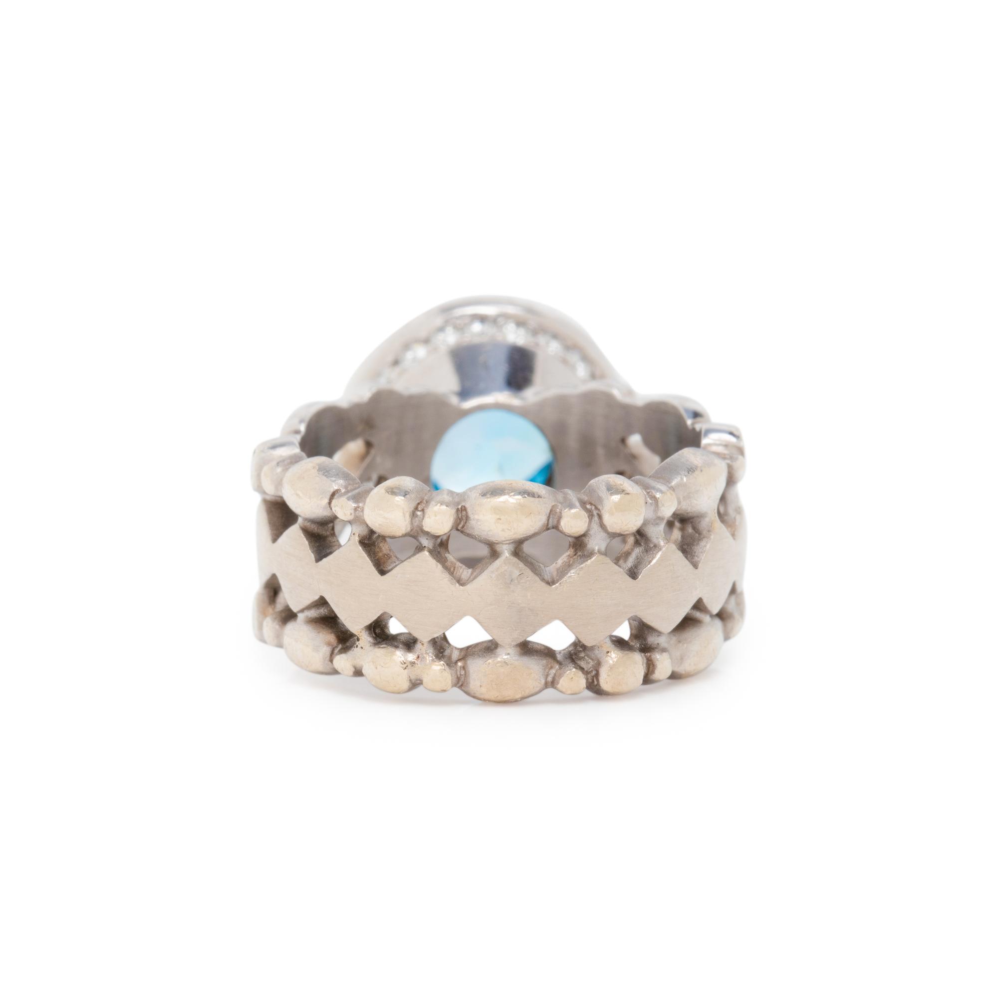 DORIS PANOS, BLUE TOPAZ AND DIAMOND RING