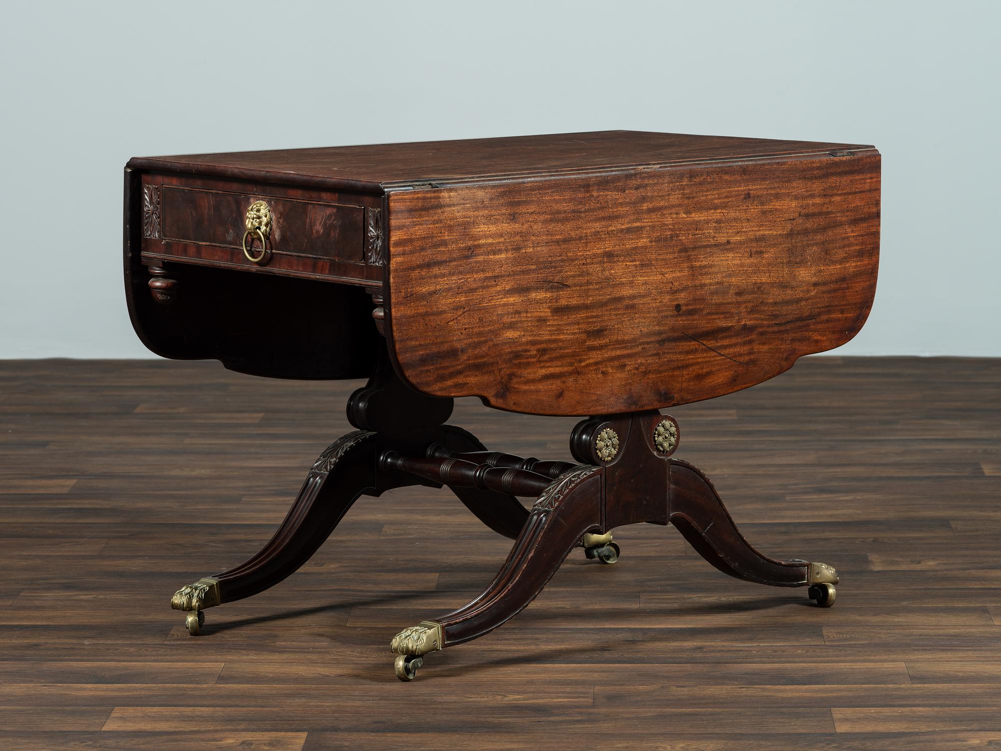 A Classical Brass-Mounted Walnut and Mahogany Pembroke Table