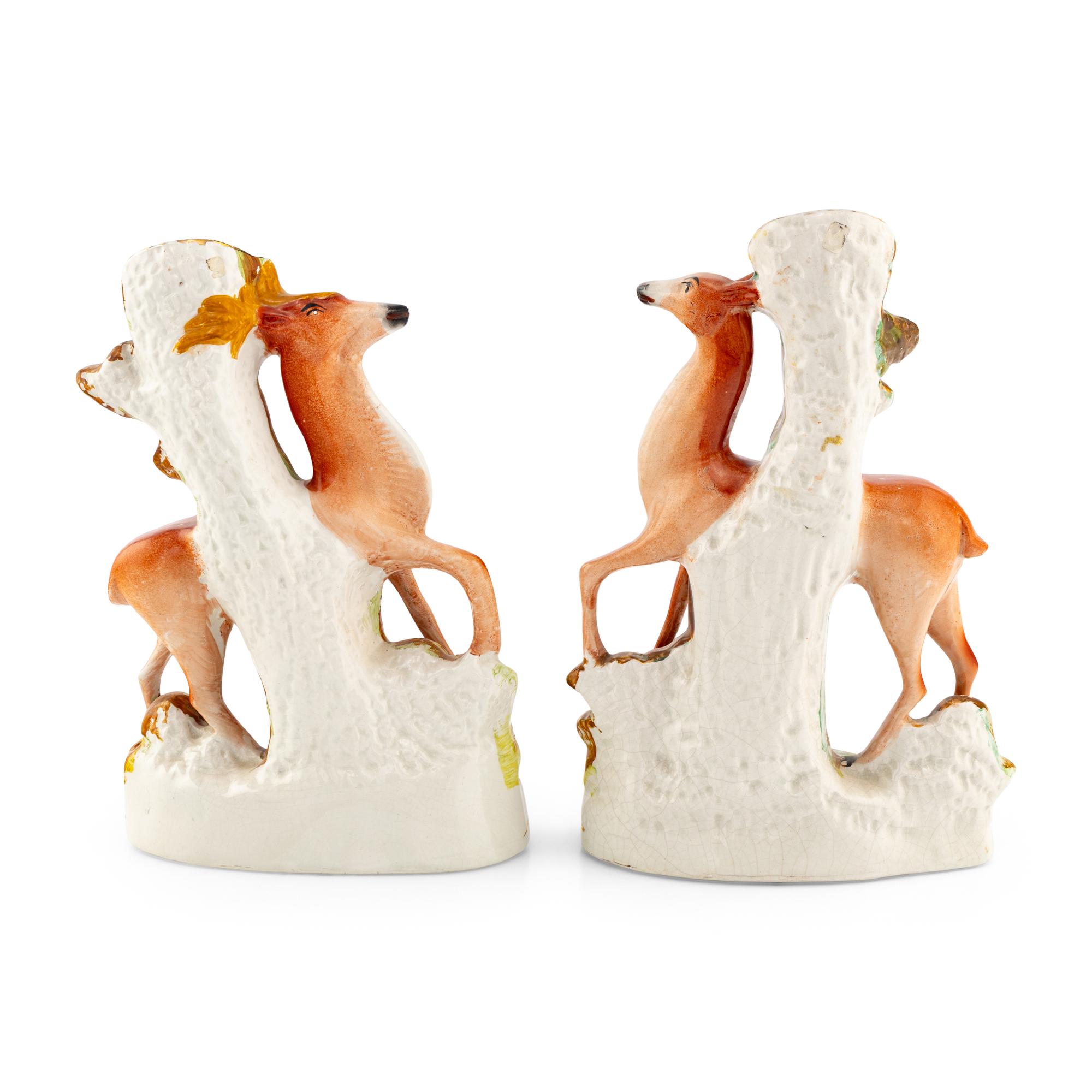 A Pair of Staffordshire Fawn-Form Spill Vases