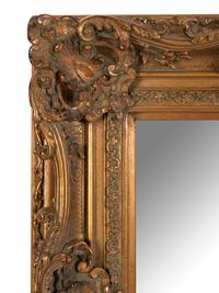 A Baroque Style Giltwood Mirror