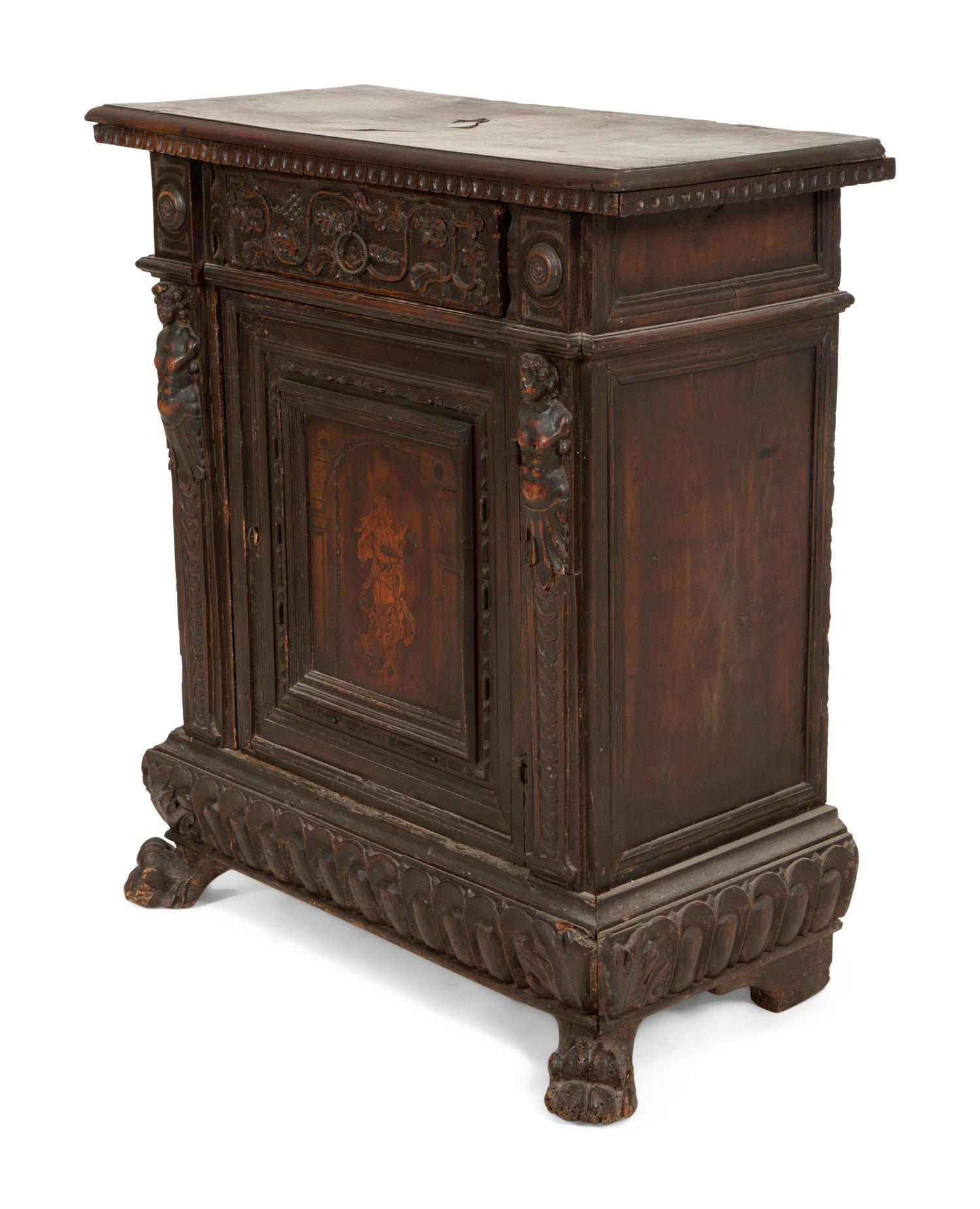 An Italian Carved Walnut Side Cabinet with Marquetry Panel Door