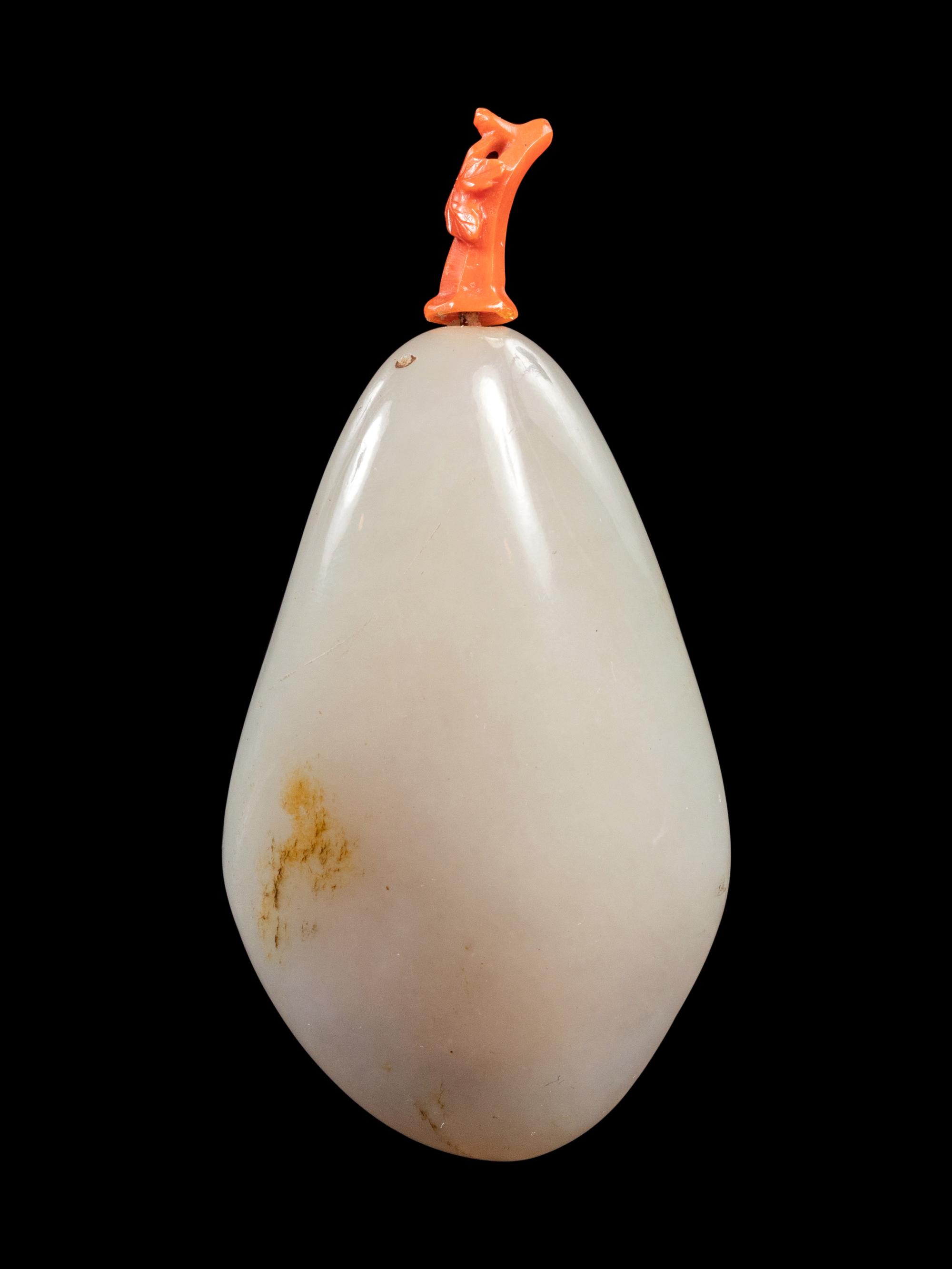 A White Jade Pebble-Form Snuff Bottle