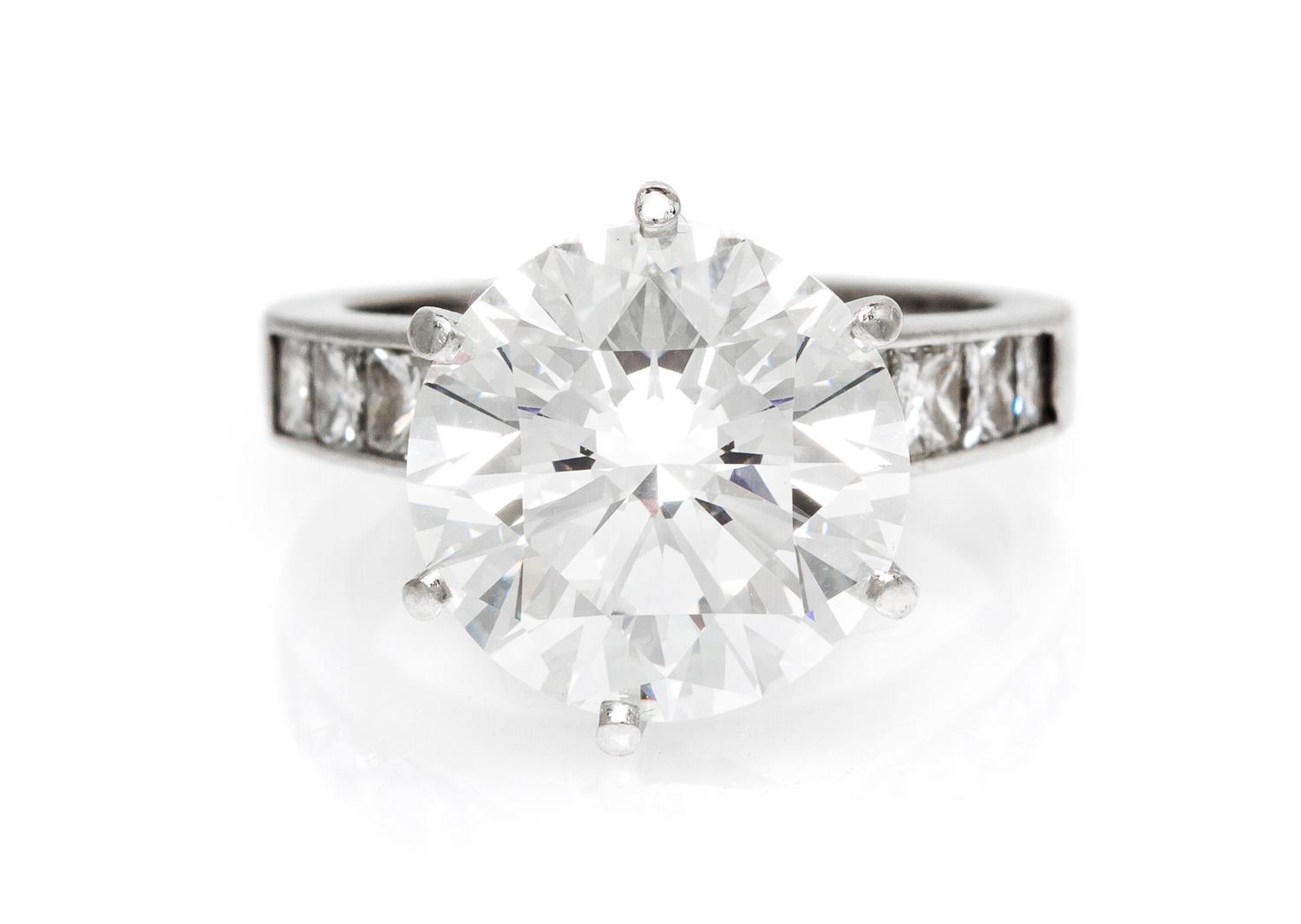 A Fine Platinum and Round Brilliant Cut Diamond Ring, 6.60 dwts.