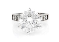 A Fine Platinum and Round Brilliant Cut Diamond Ring, 6.60 dwts.