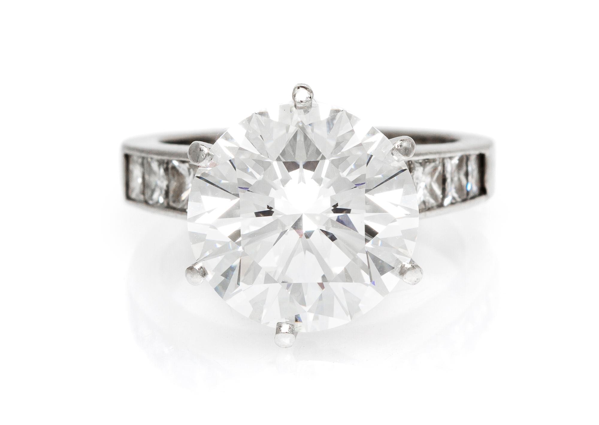 A Fine Platinum and Round Brilliant Cut Diamond Ring, 6.60 dwts.