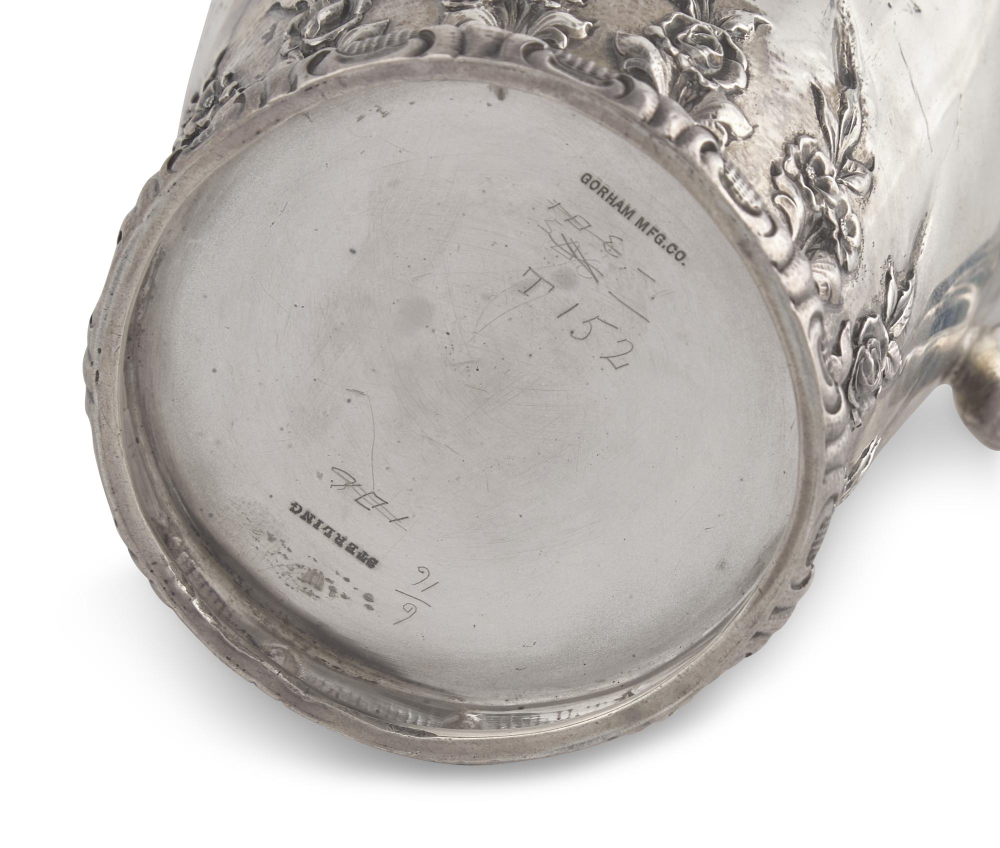 A Presentation Sterling Silver Floral Repousse Syrup Pitcher Awarded to Mrs. Washington Augustus Roebling, Gorham Mfg. Co., Providence, RI, Circa 1890s