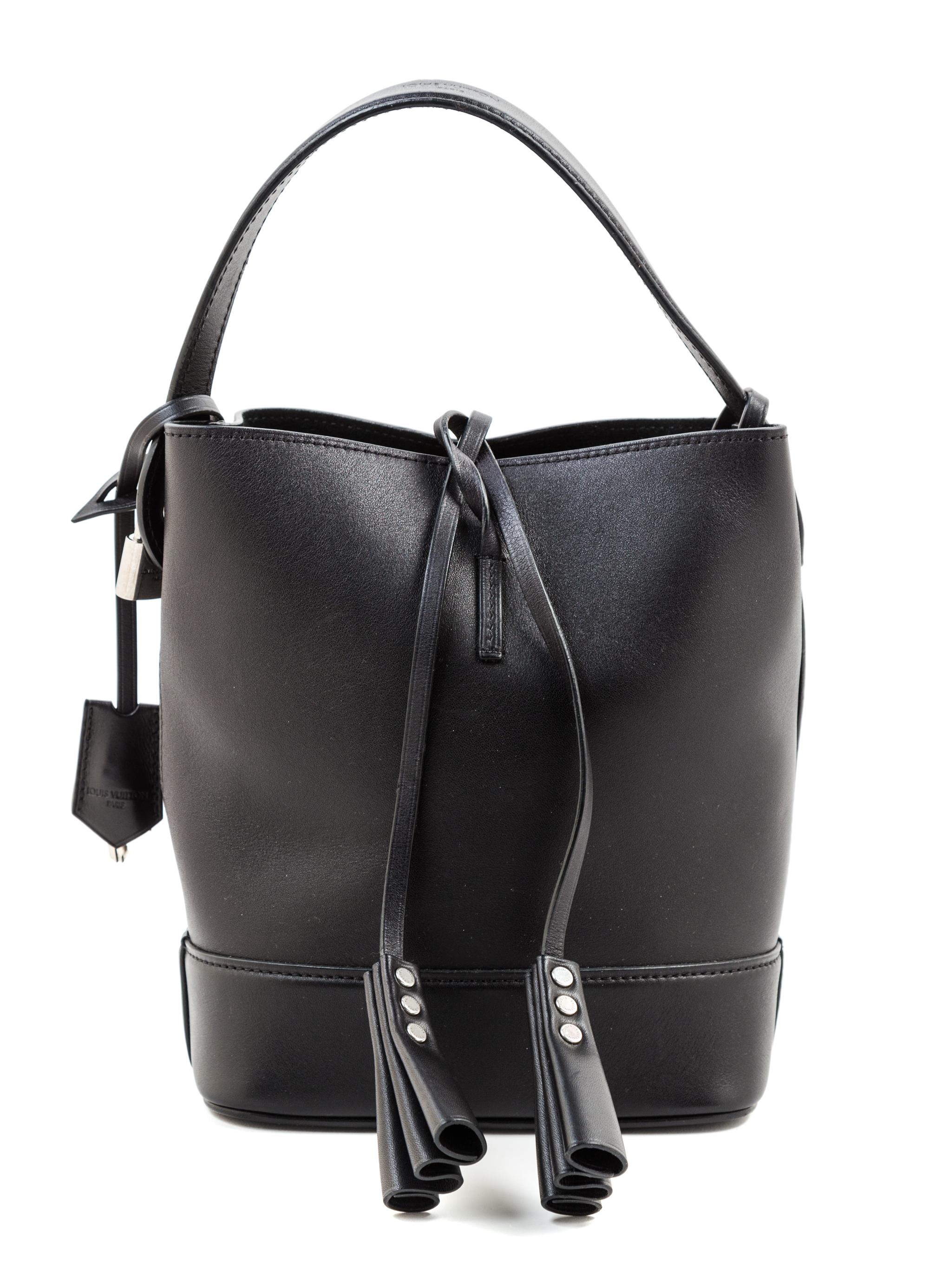 A Louis Vuitton Black Leather Cuir Nuance Tote, 7" x 9" x 4.25"; Handle drop: 4.5".