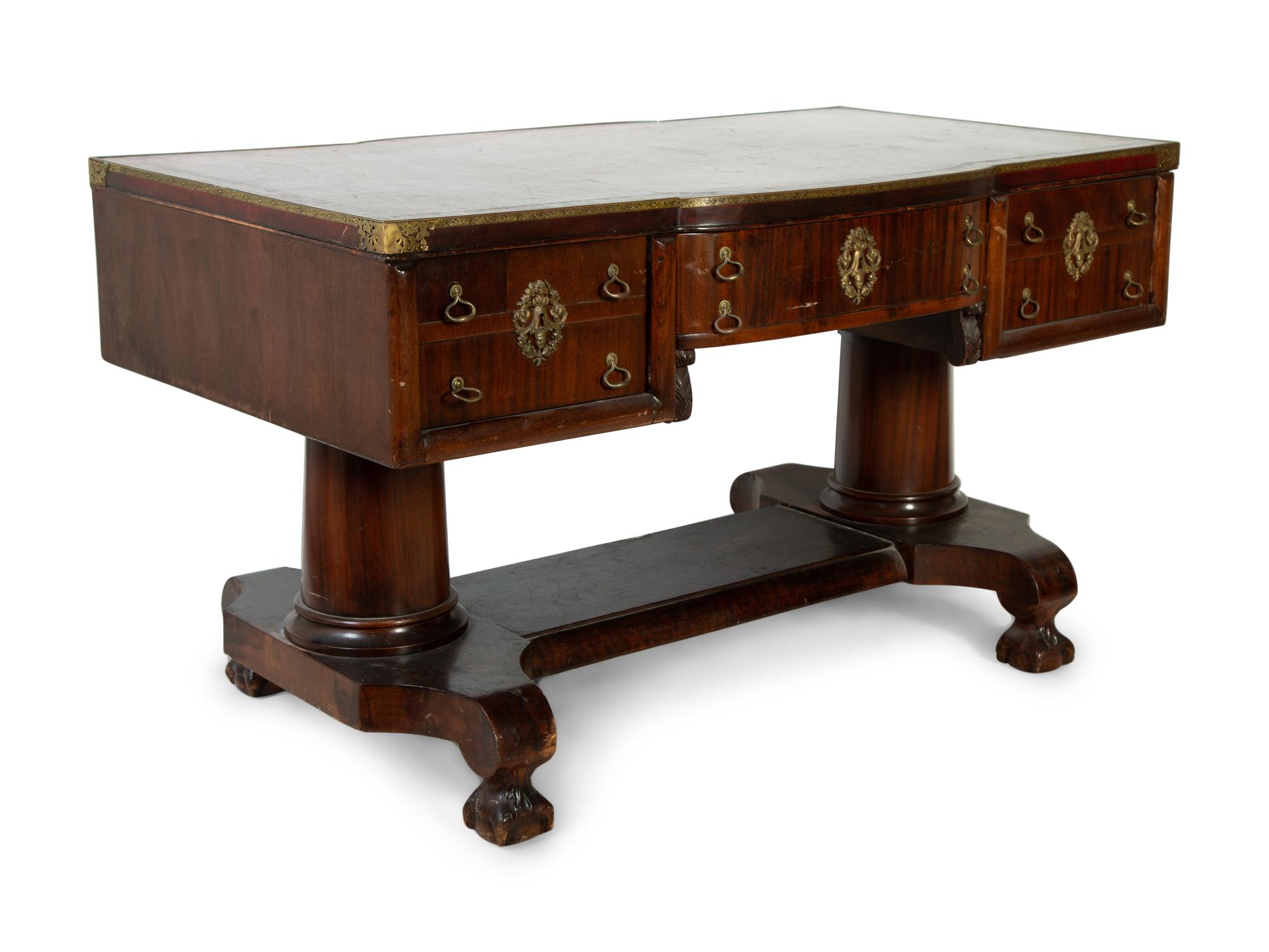 A Late Regency Style Mahogany Partner's Desk — 19TH CENTURY