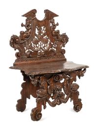An Italian Baroque Style Carved Walnut Hall Bench