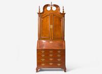 A Chippendale Carved Cherrywood Desk and Bookcase