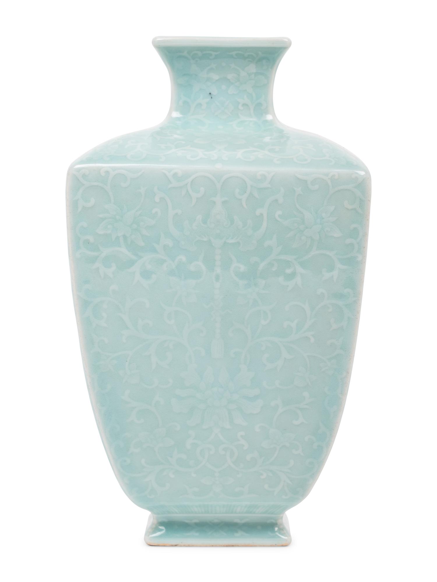A Chinese Carved Celadon Glazed Porcelain 'Lotus' Vase