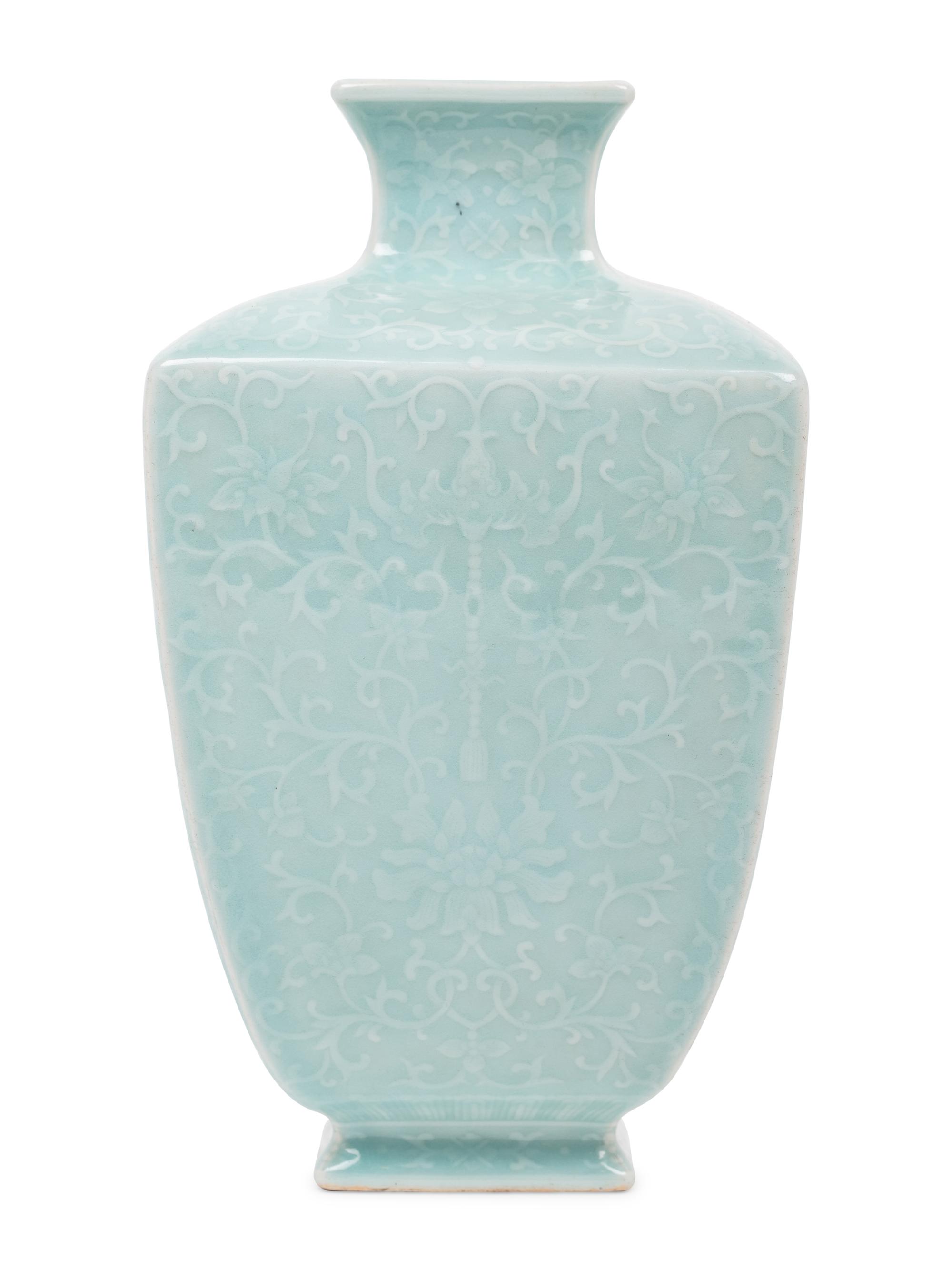 A Chinese Carved Celadon Glazed Porcelain 'Lotus' Vase