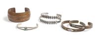 Six Southwestern Bracelets Length of largest 5 7/8 x opening 1 1/8 x width 1 1/8 inches