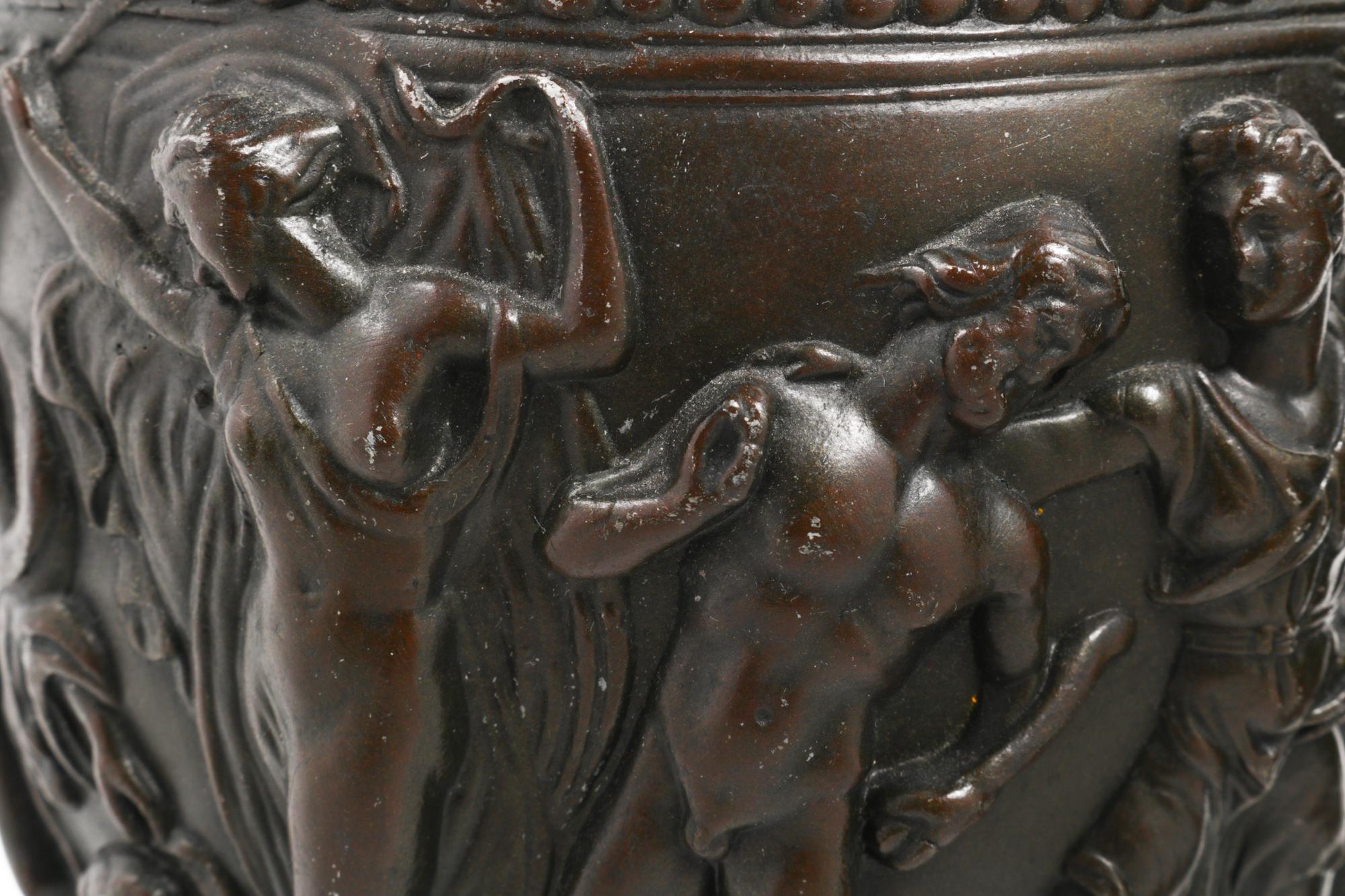 A Pair of Grand Tour Cast Metal and Marble Urns