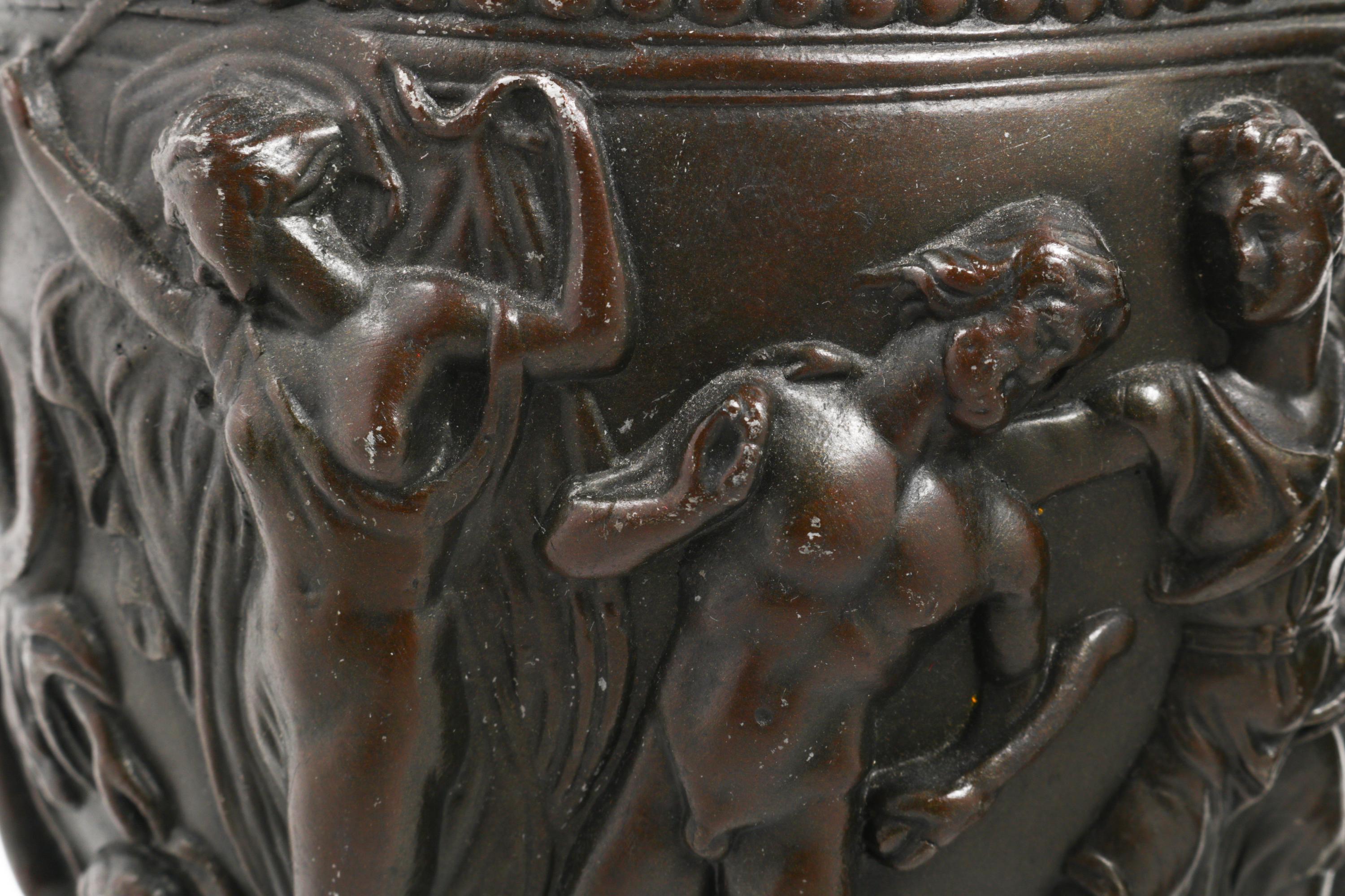 A Pair of Grand Tour Cast Metal and Marble Urns