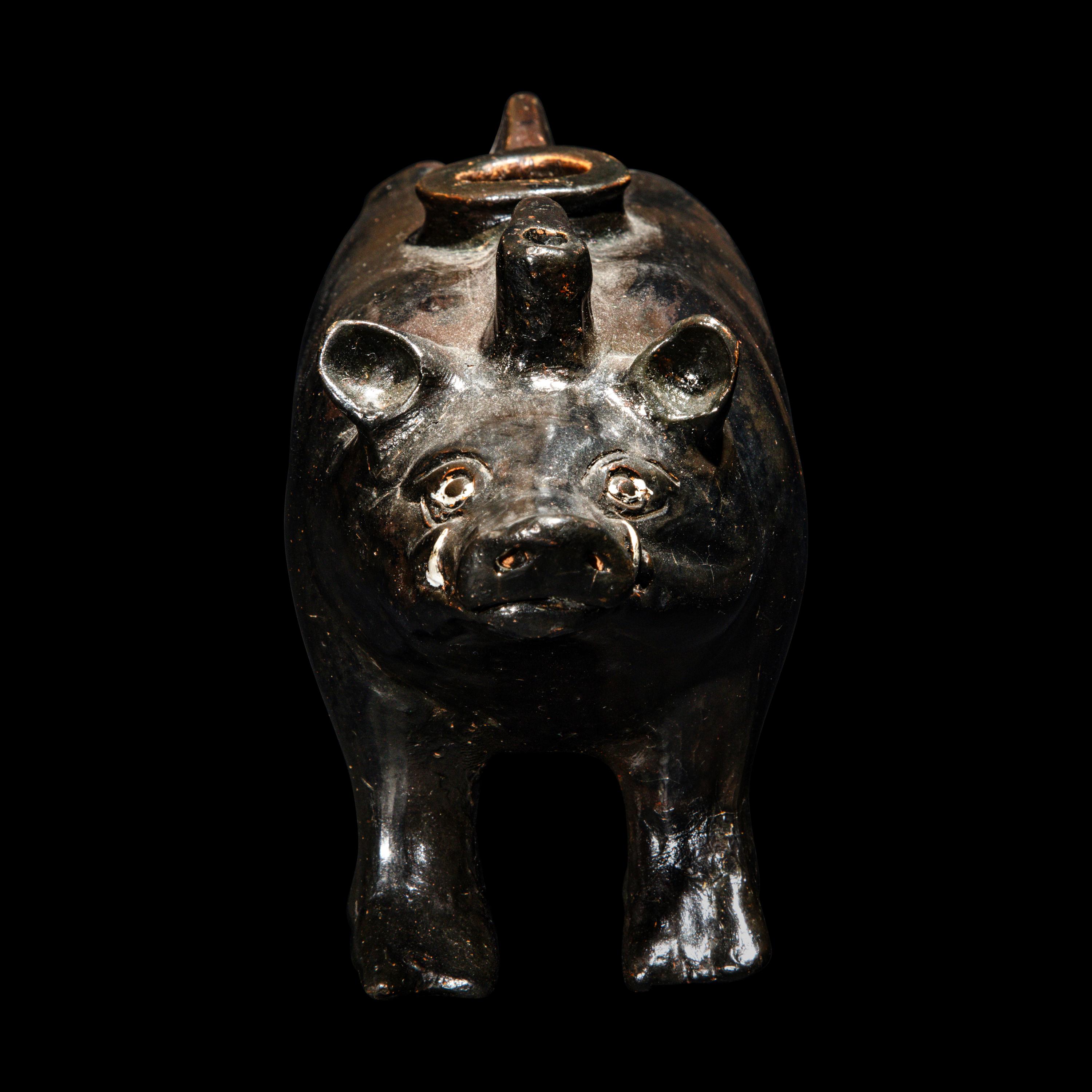 A South Italian Black-Glazed Askos in the form of a Boar