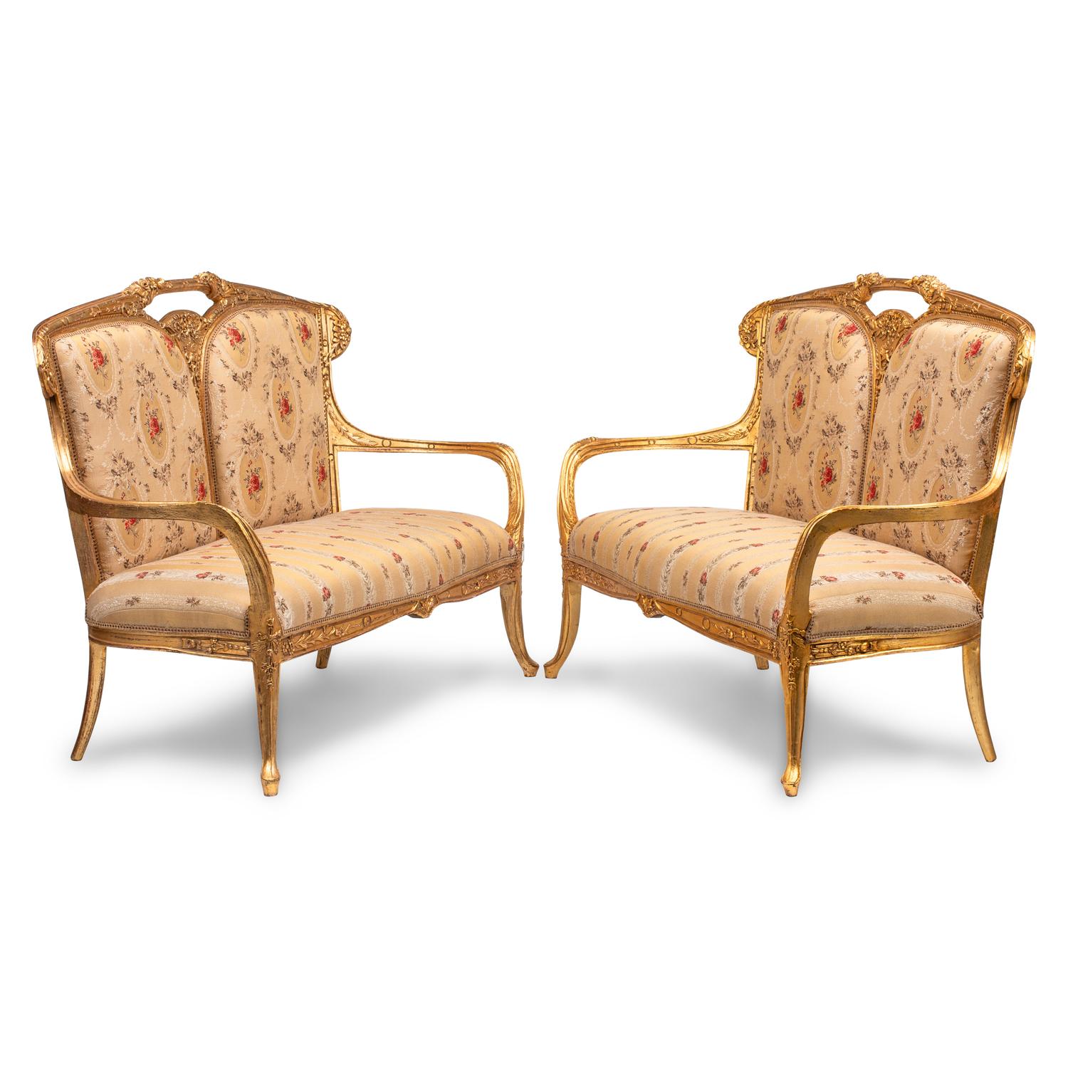 A Pair of Art Nouveau Style Giltwood Settees