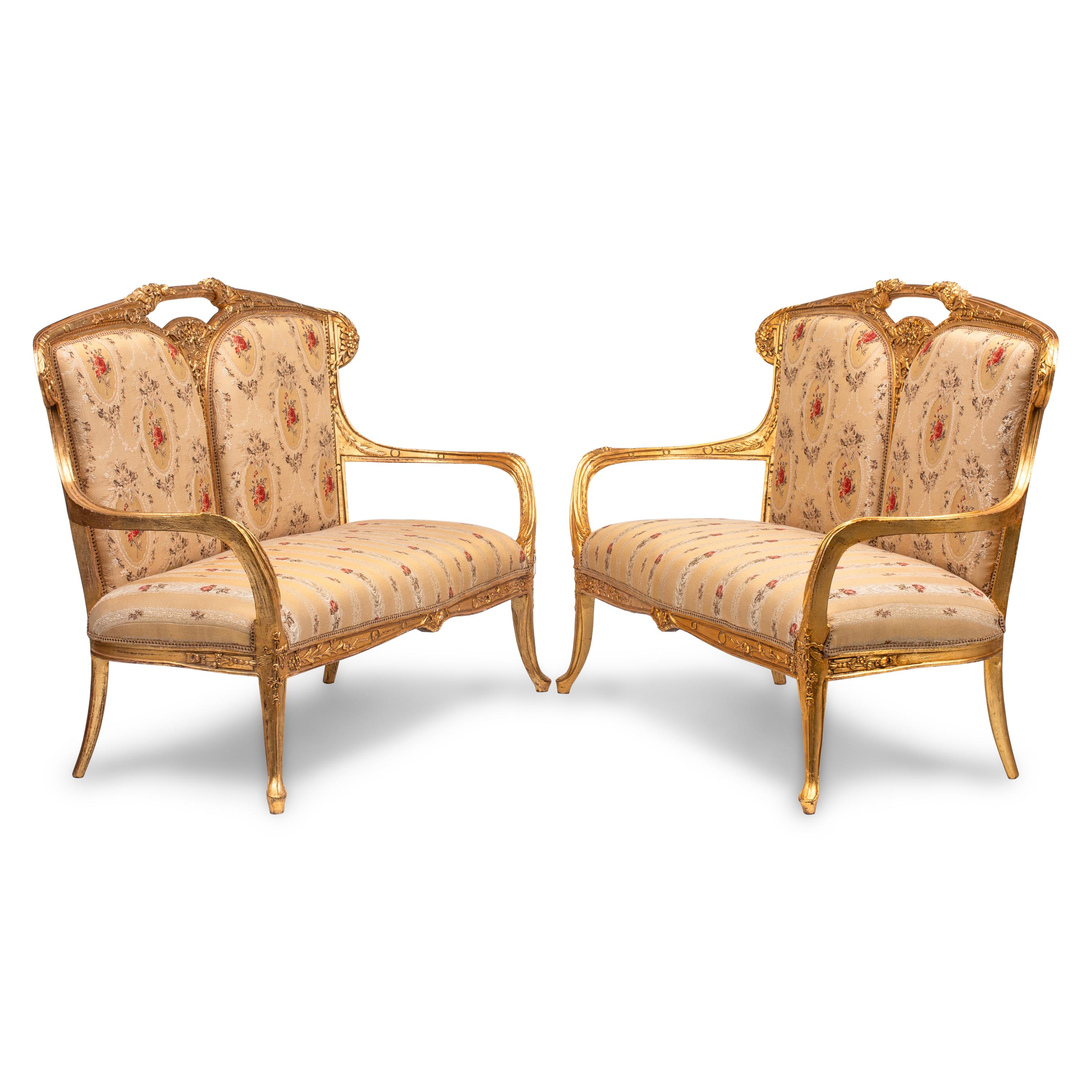 A Pair of Art Nouveau Style Giltwood Settees