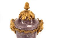 A Pair of French Gilt Bronze and Amethyst Figural Urns