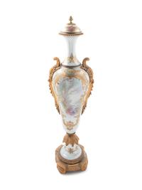 A Large Sèvres Style Gilt Bronze Mounted Painted and Parcel Gilt Porcelain Covered Urn