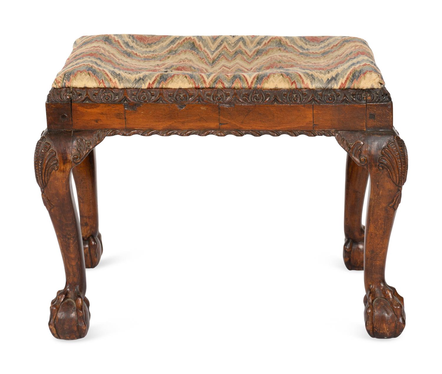 A George III Carved Walnut Footstool