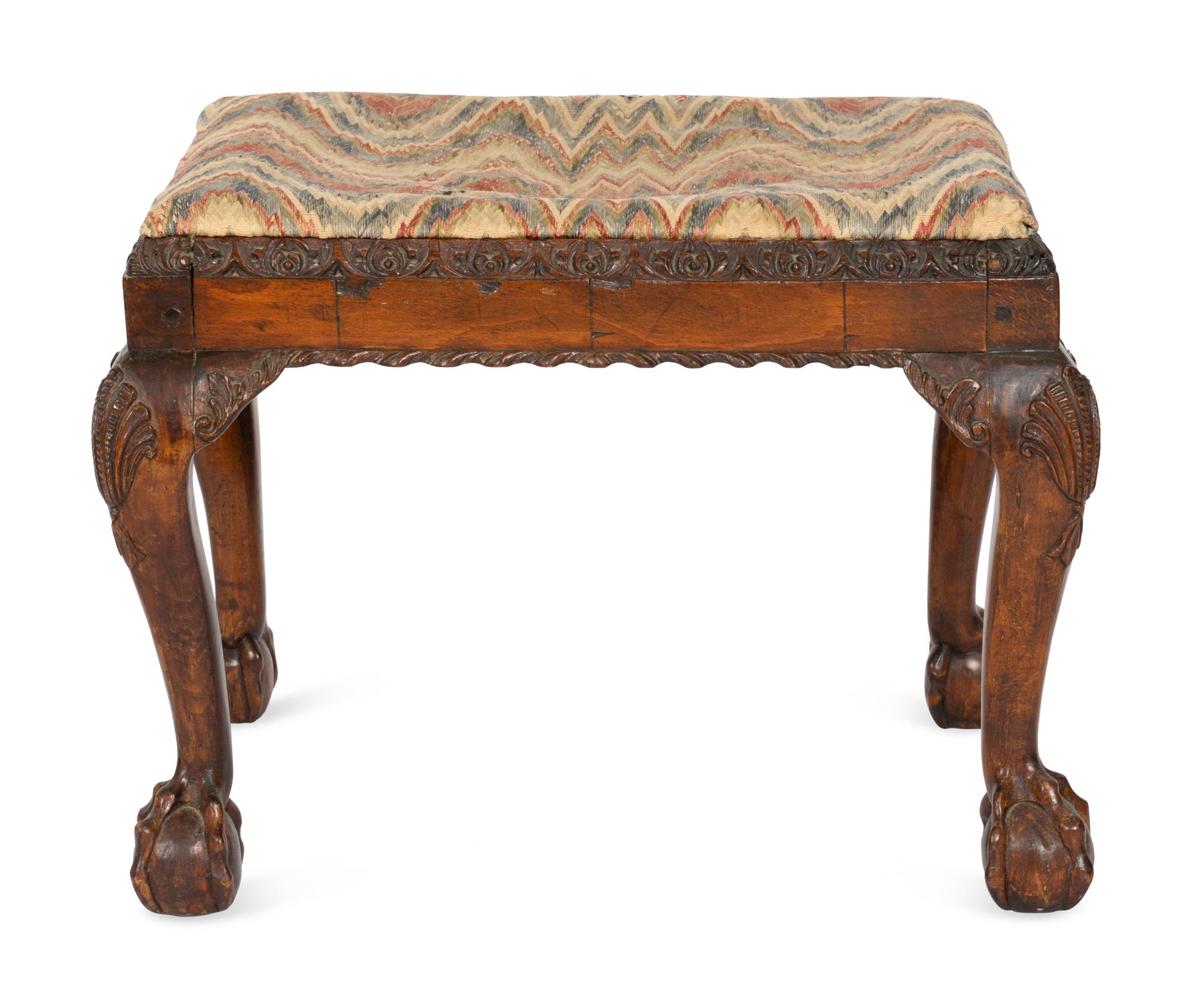 A George III Carved Walnut Footstool