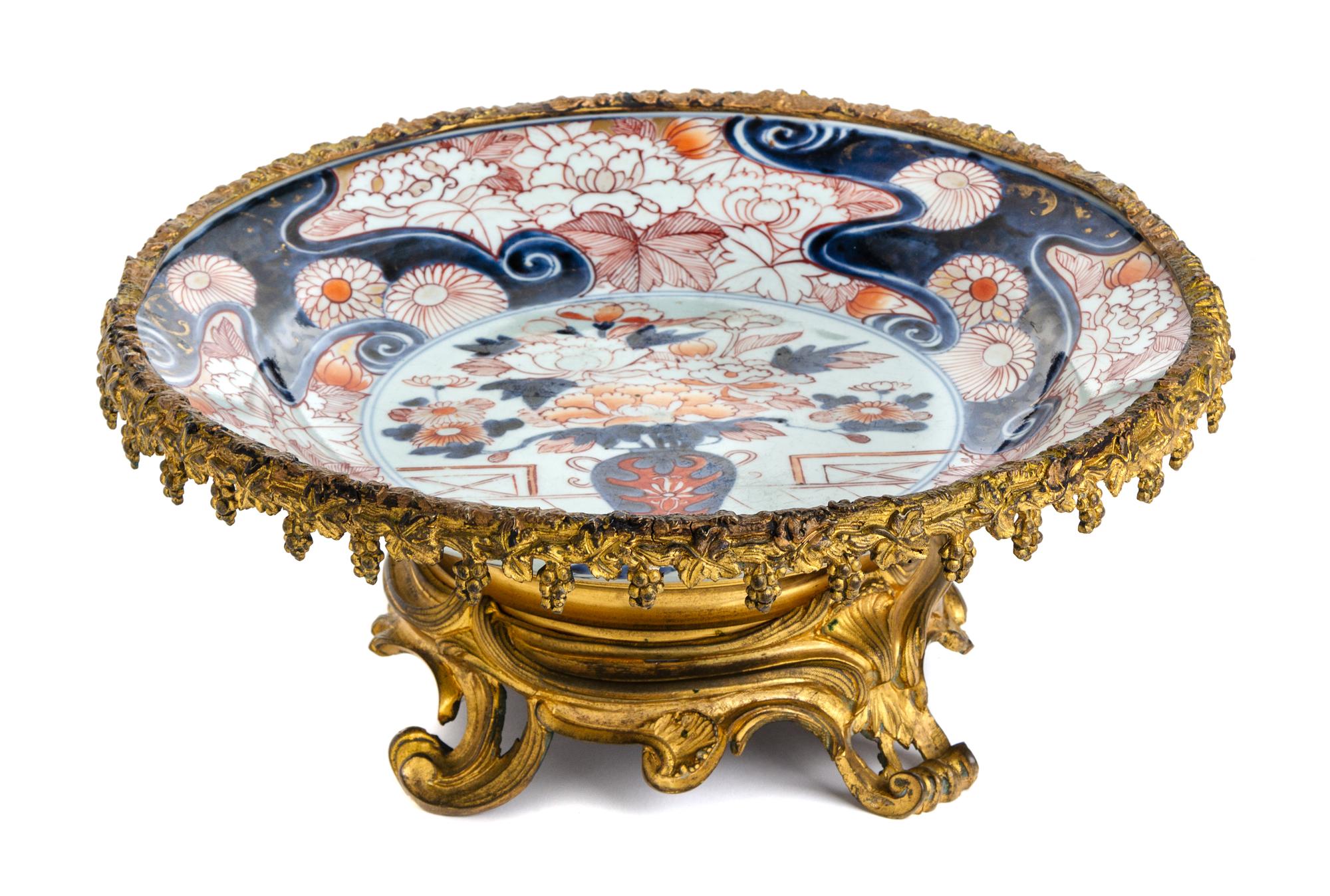 A Gilt Metal Mounted Imari Palette Porcelain Charger Width 14 1/2 inches. — LATE 19TH CENTURY