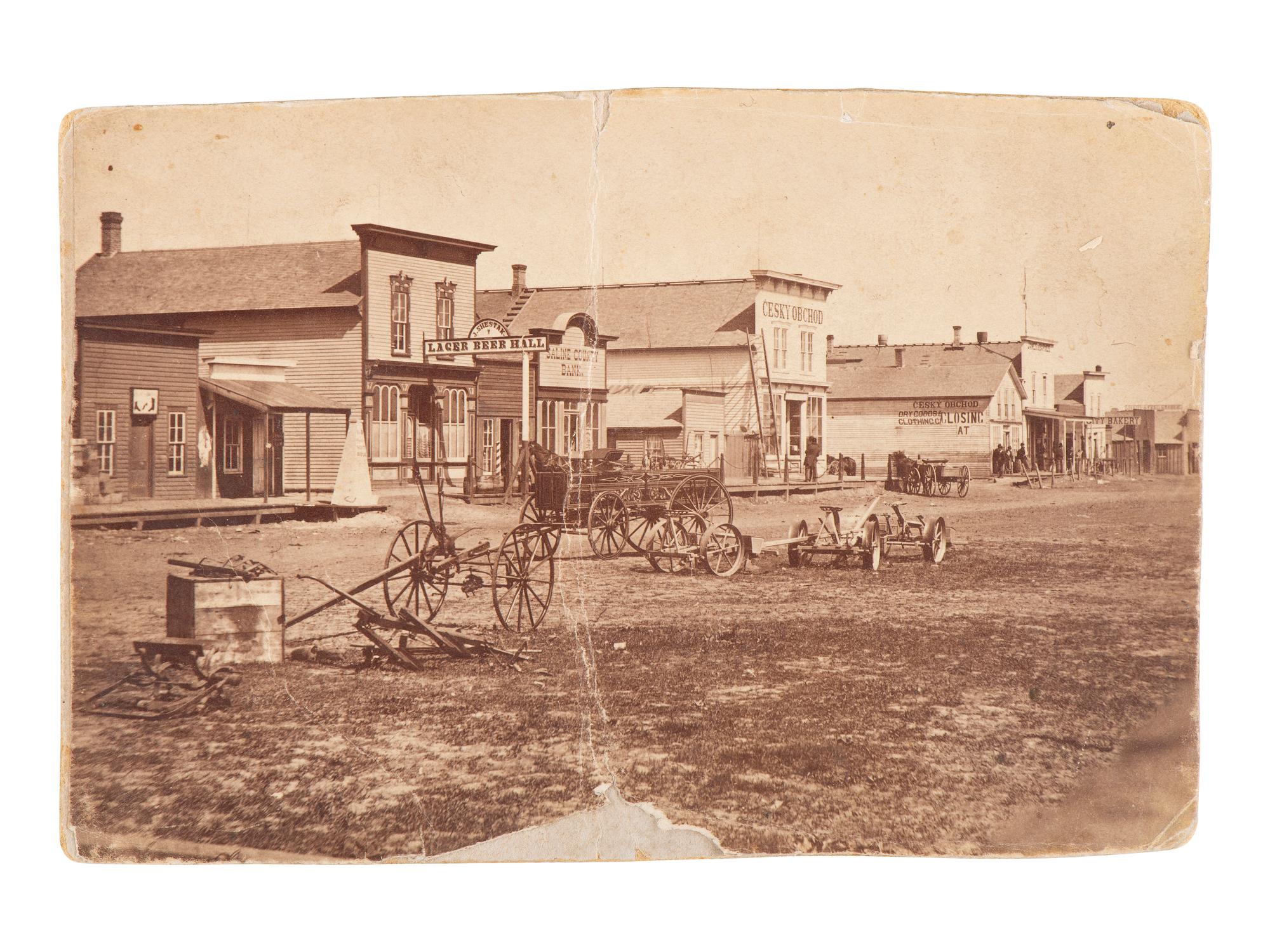 [WESTERN AMERICANA]. 9 photographs of western subjects, incl. street scenes and cowboys.