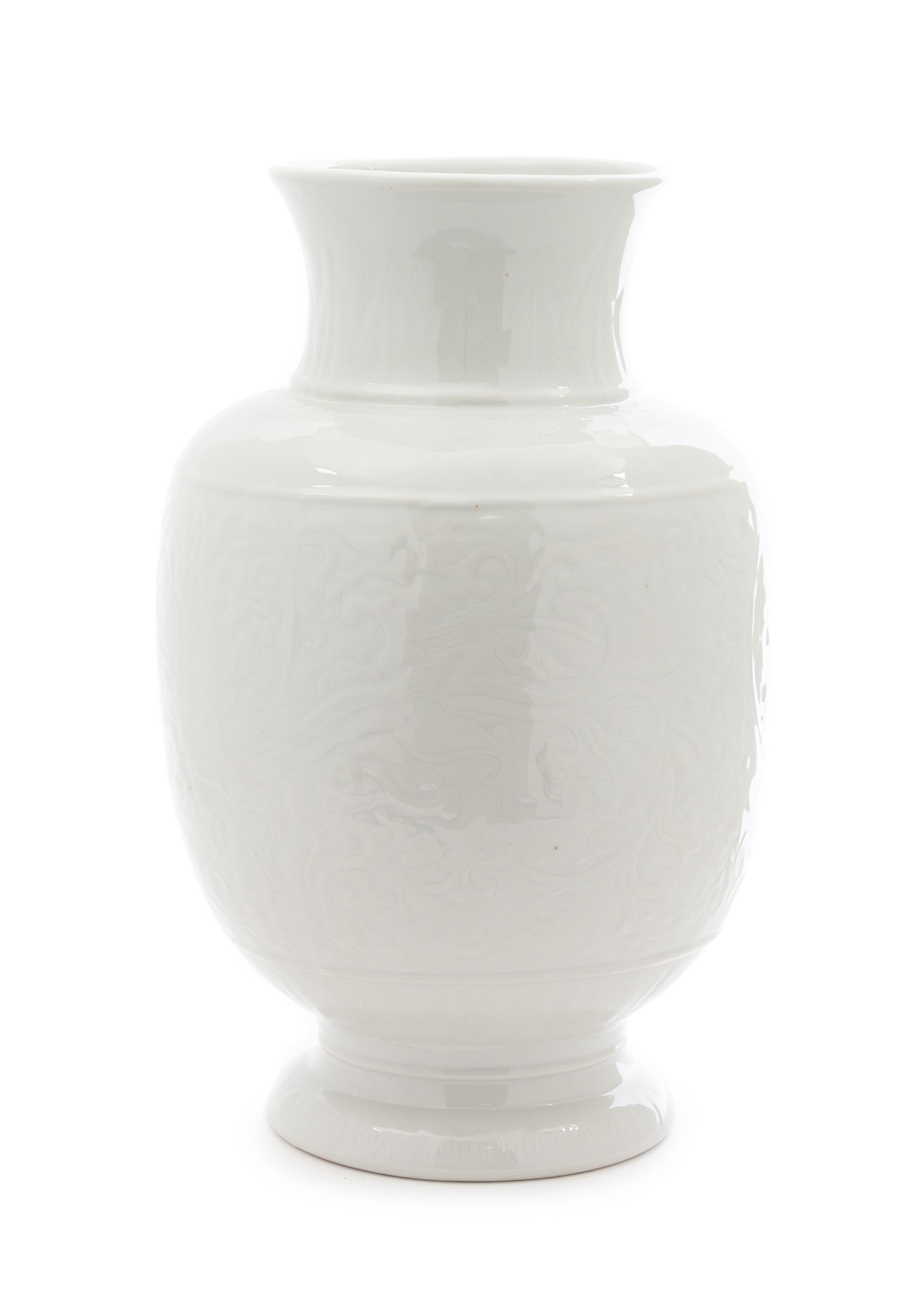 A Chinese Carved White Glazed Porcelain Vase Height 13 1/4 inches. — 20TH CENTURY