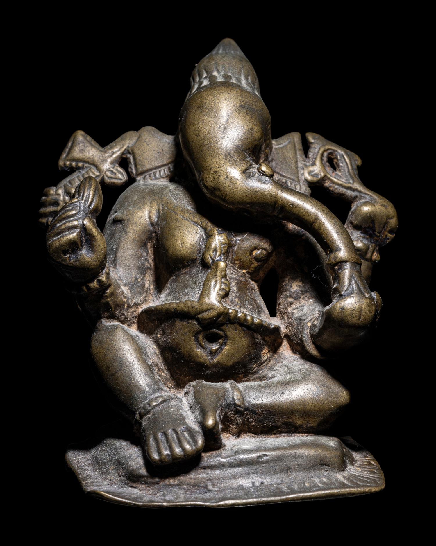 An Indian Bronze Figure of Ganesha