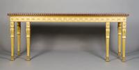A Neoclassical Parcel Gilt Console Table, Height 33 1/4 x width 84 x depth 24 inches.