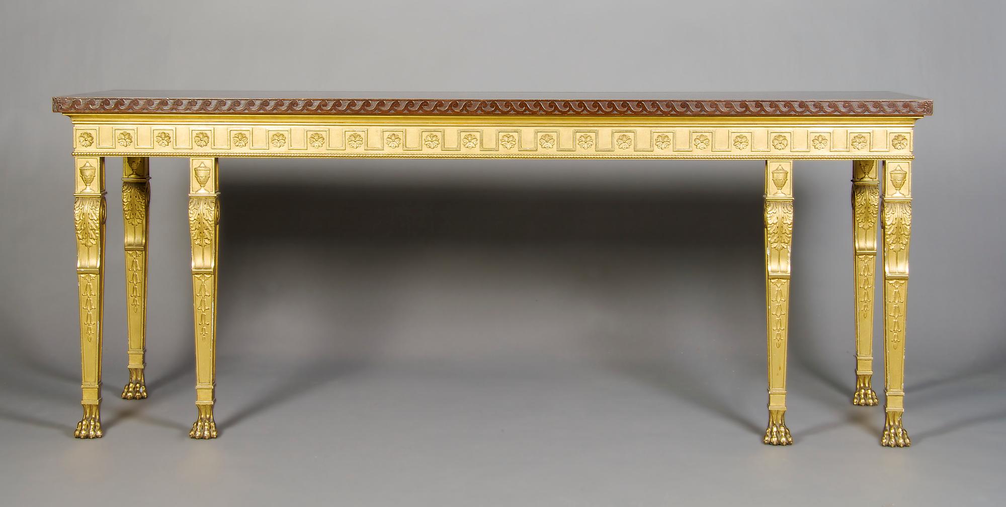 A Neoclassical Parcel Gilt Console Table, Height 33 1/4 x width 84 x depth 24 inches.