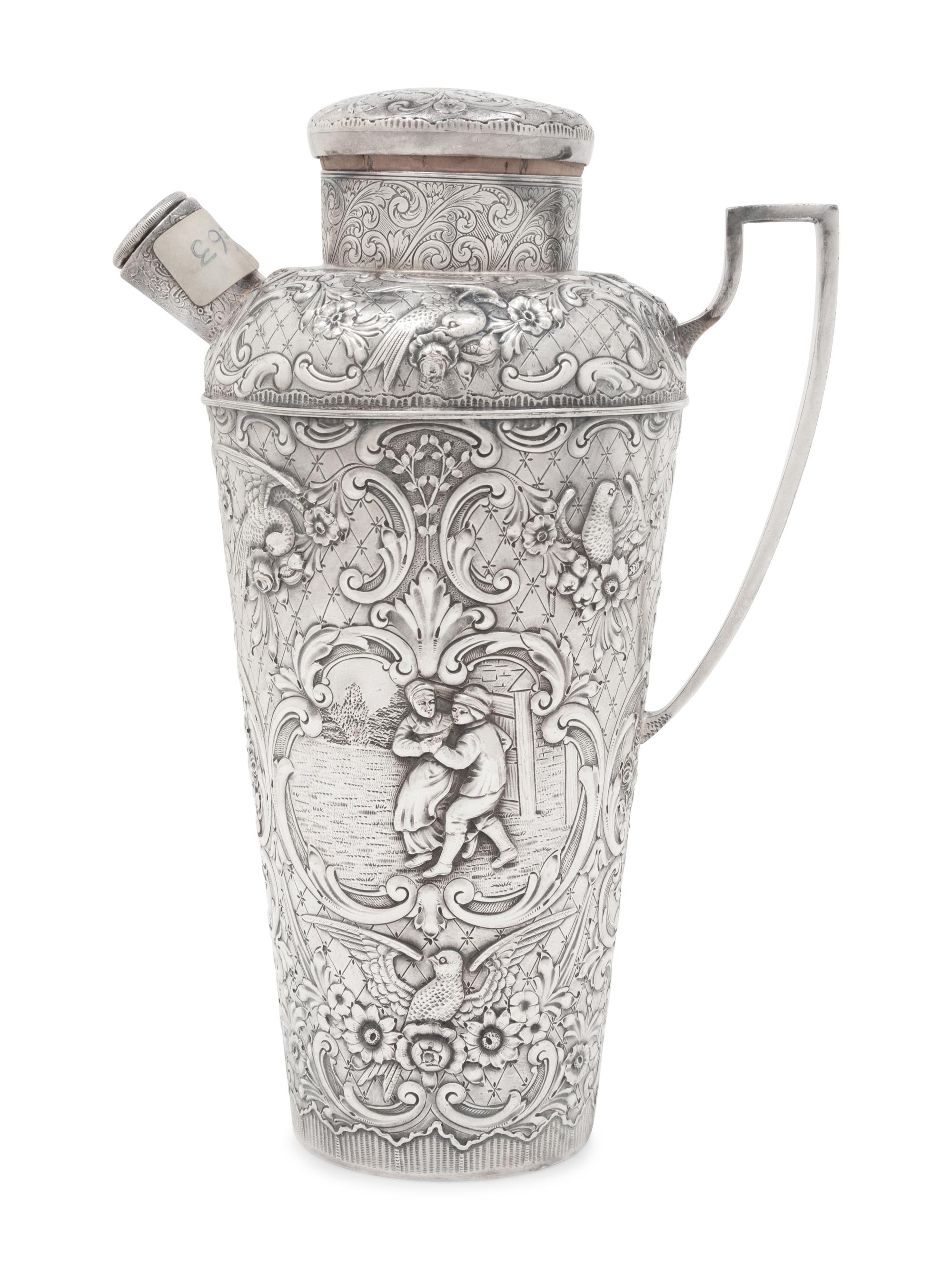 A Repoussé-Decorated Silver-Plate Cocktail Shaker