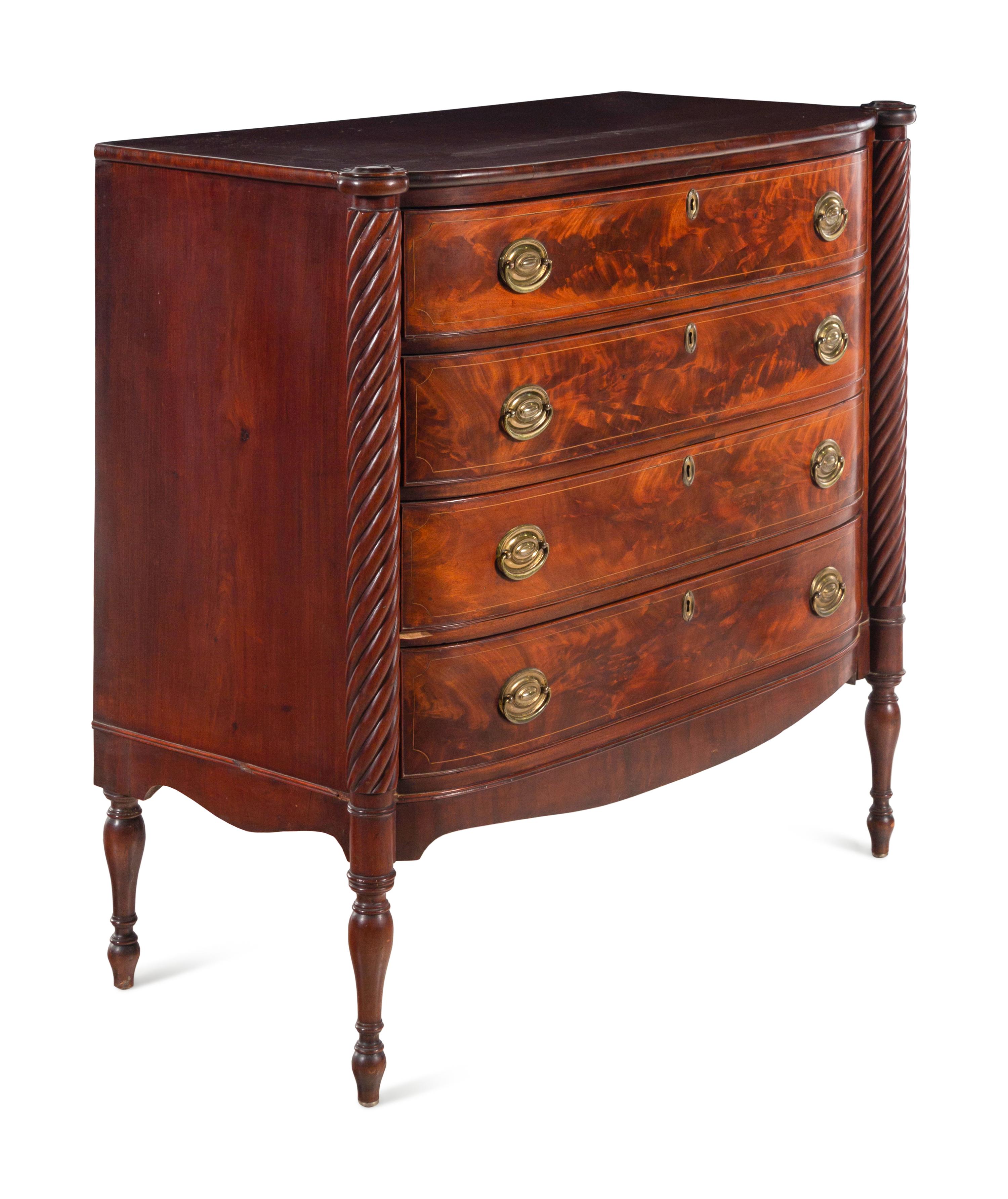 A Federal Spiral-Twist Carved Mahogany Bow Front Chest of Drawers