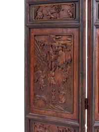 A Chinese Carved Hardwood Four-Panel Floor Screen
