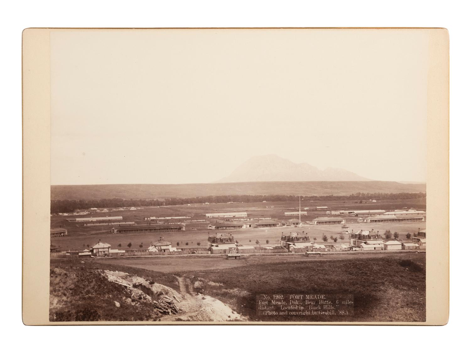 [LATE INDIAN WARS]. GRABILL, John C.H. (1849-1903), photographer. Fort Meade, Dak. Bear Butte, 6 miles distant. Located in "Black Hills." [South Dakota],1888.