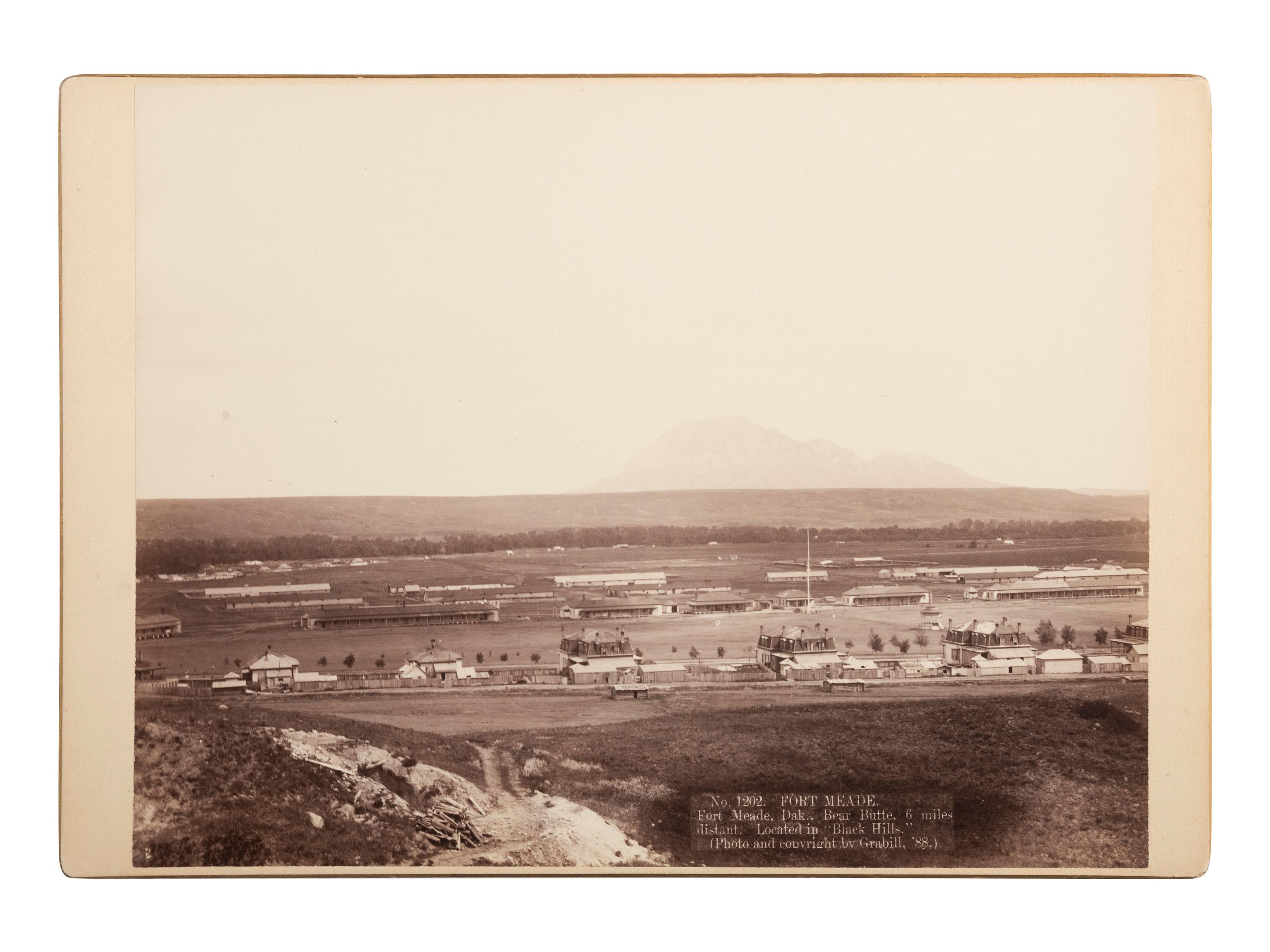 [LATE INDIAN WARS]. GRABILL, John C.H. (1849-1903), photographer. Fort Meade, Dak. Bear Butte, 6 miles distant. Located in "Black Hills." [South Dakota],1888.