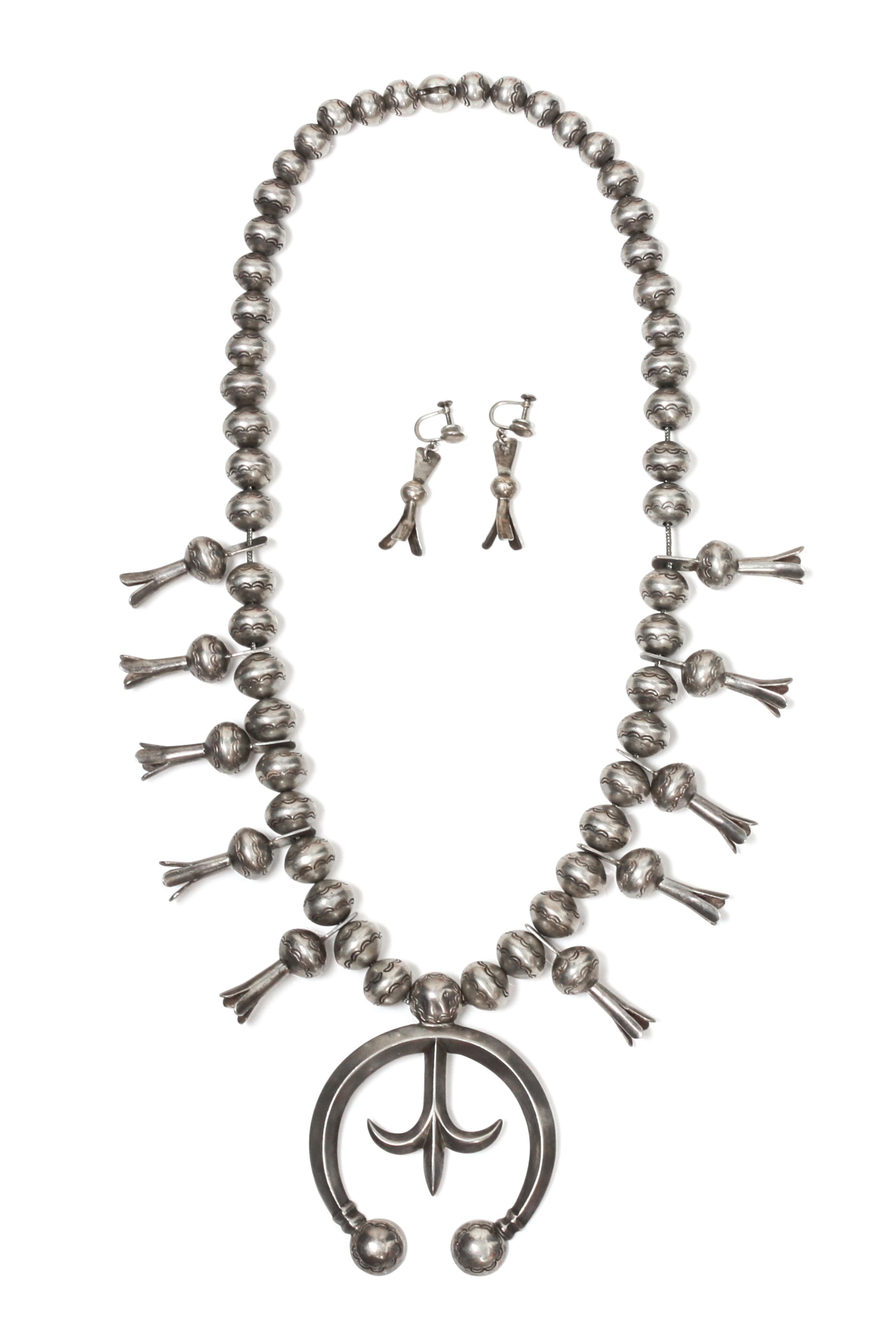 A Navajo Squash Blossom Necklace Length 22 inches.