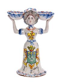 A French Pottery Figure Height 7 3/4 inches.
