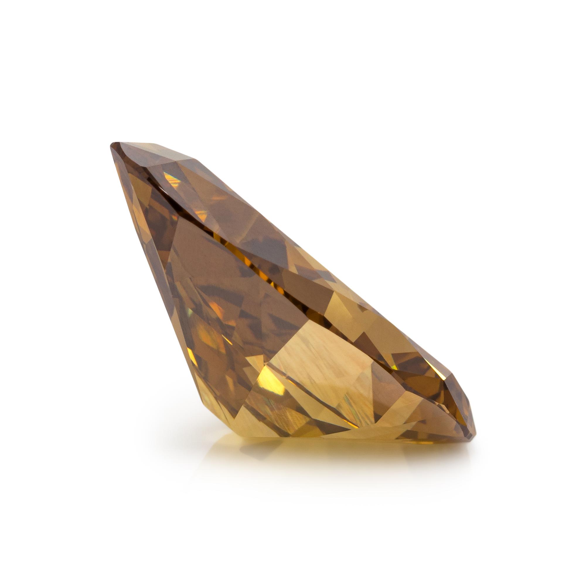 8.40 CARAT PEAR SHAPED TREATED FANCY DEEP BROWN-YELLOW DIAMOND