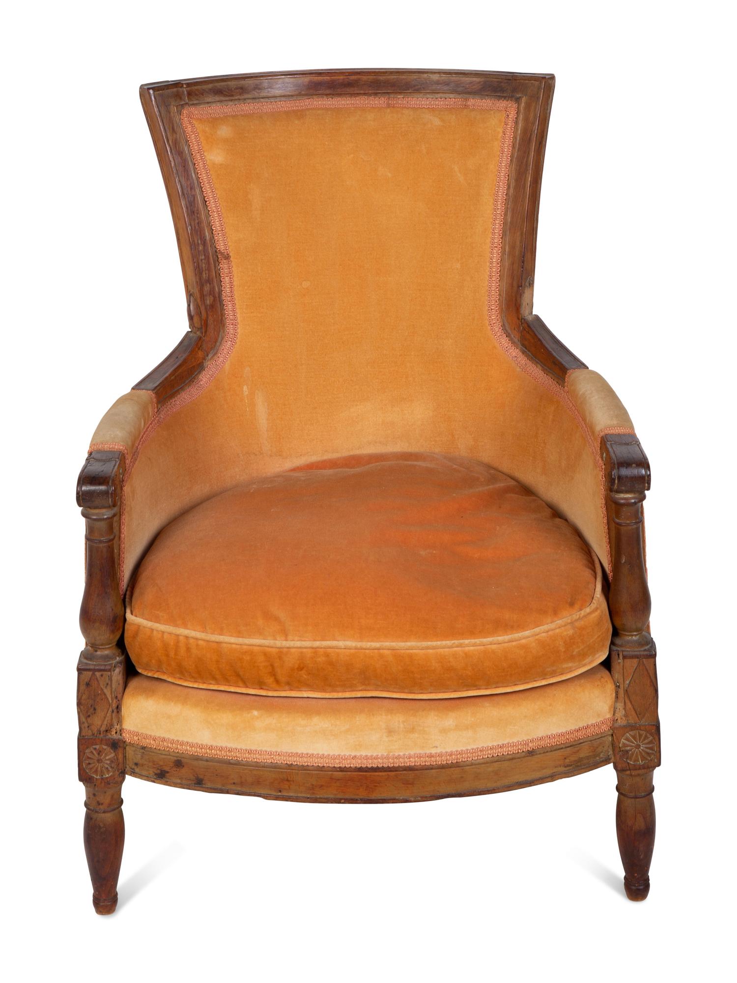 A Diminutive Directoire Carved Fruitwood Bergère — CIRCA 1790