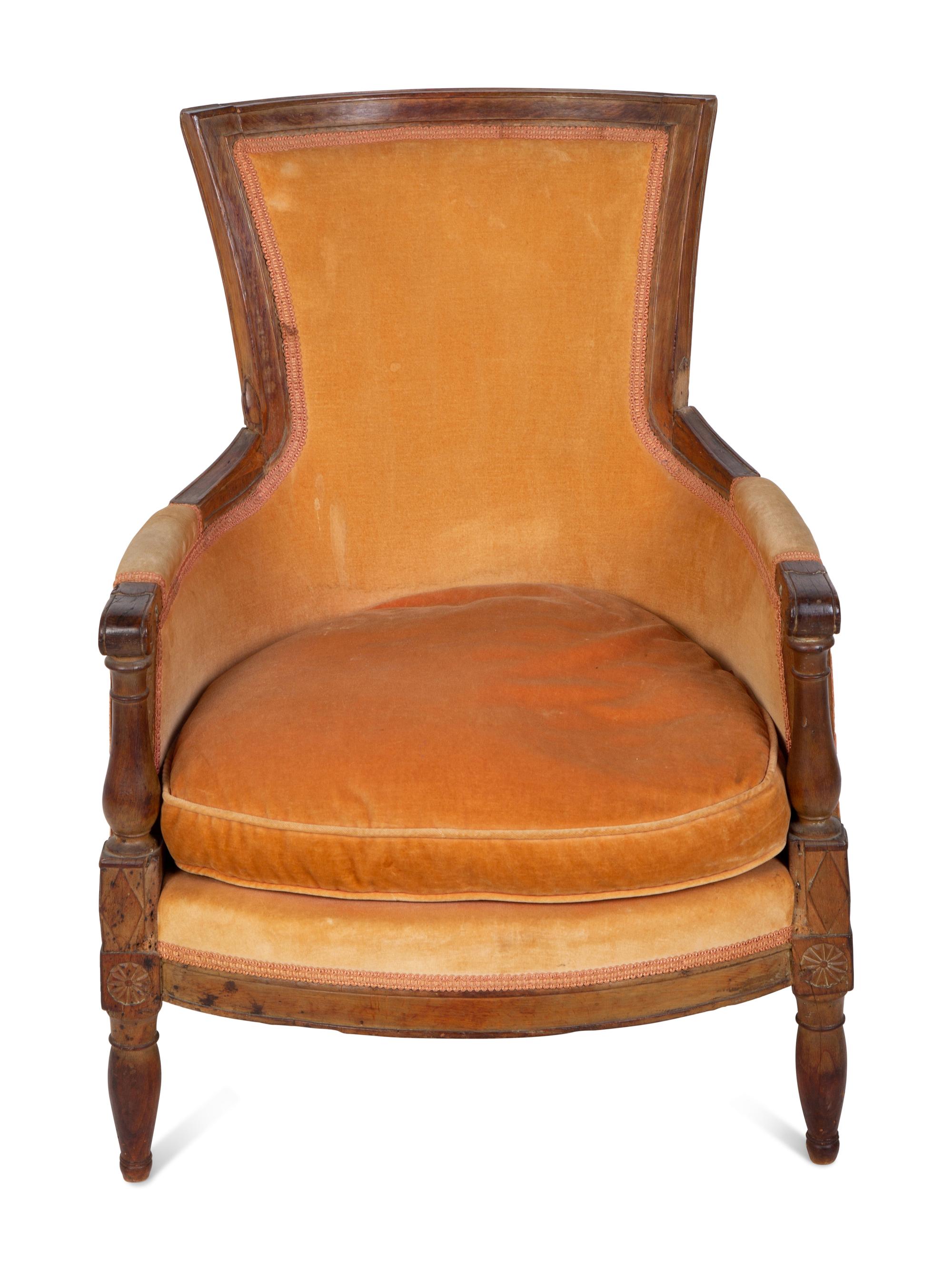 A Diminutive Directoire Carved Fruitwood Bergère — CIRCA 1790
