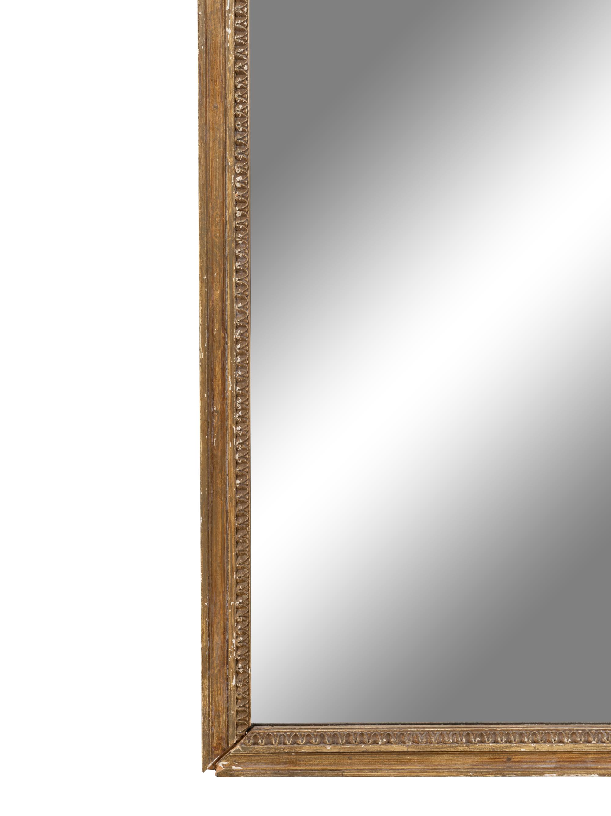 A Louis XVI Style Carved and Gray Painted Pier Mirror