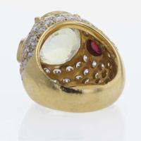 An 18K Yellow Gold and Gemstone Ring