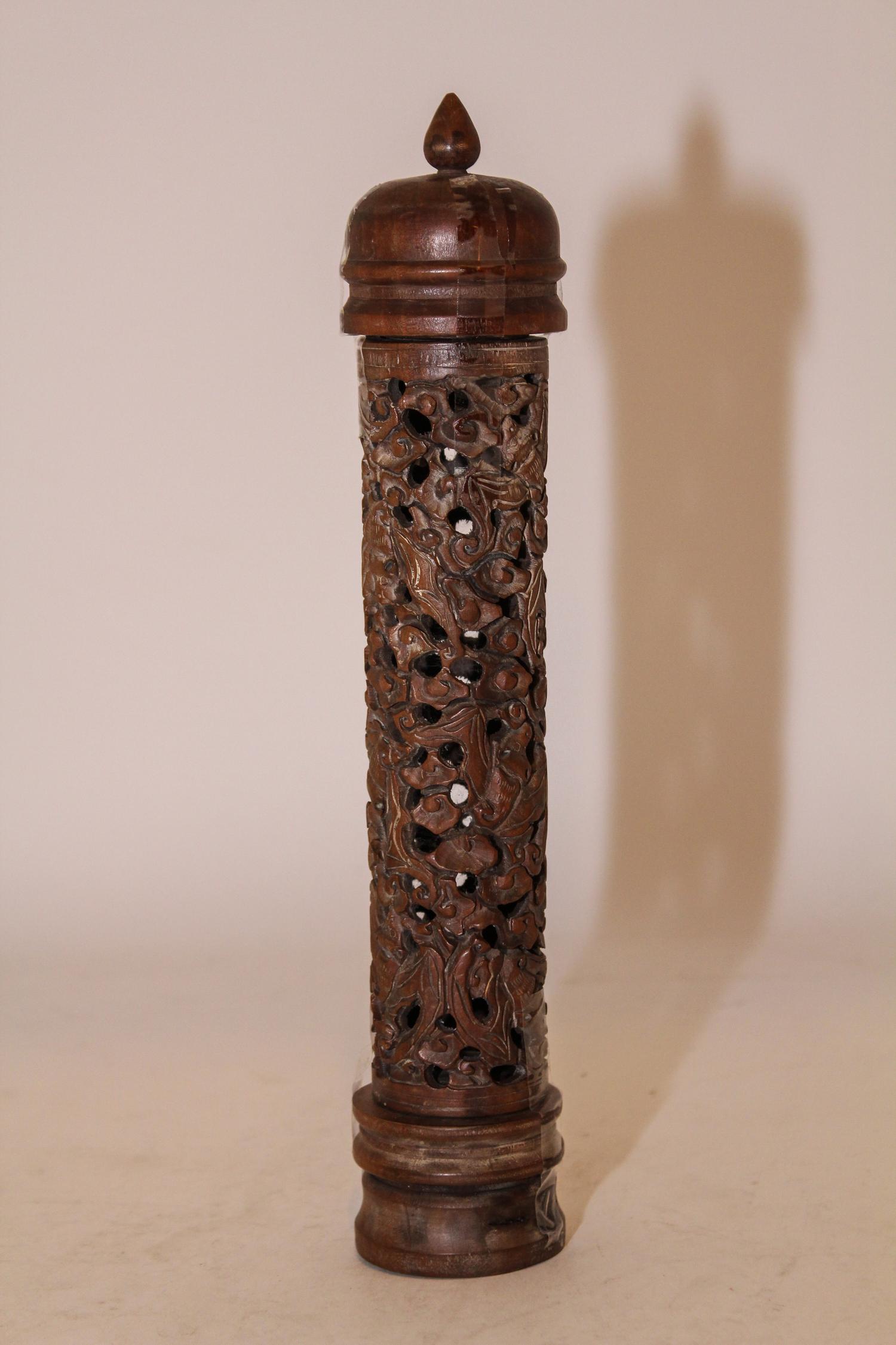 A Carved Wood Parfumier. Height 12 inches.