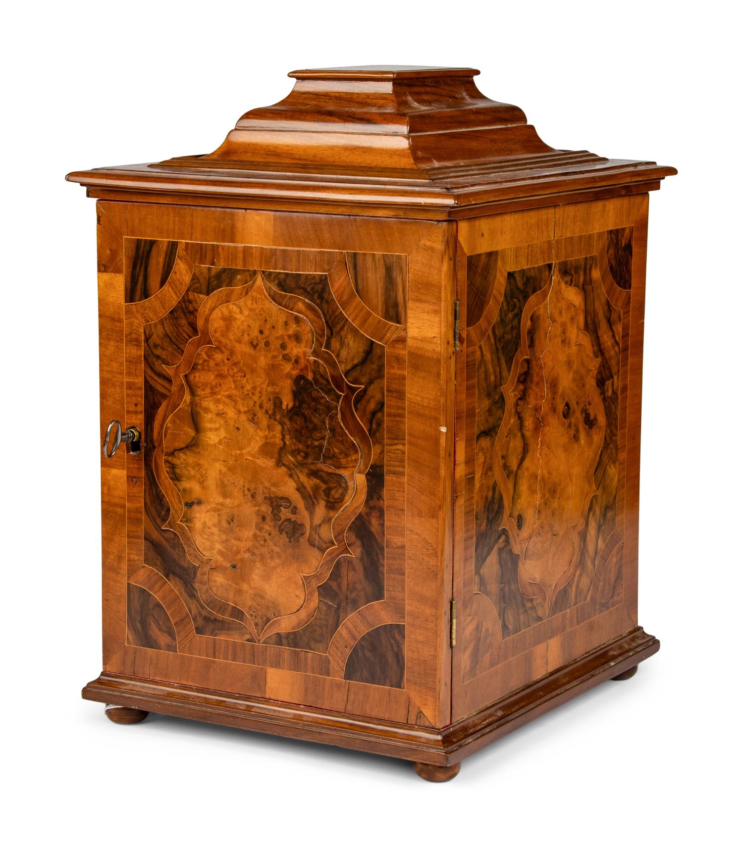 A Continental Walnut Collector's Cabinet