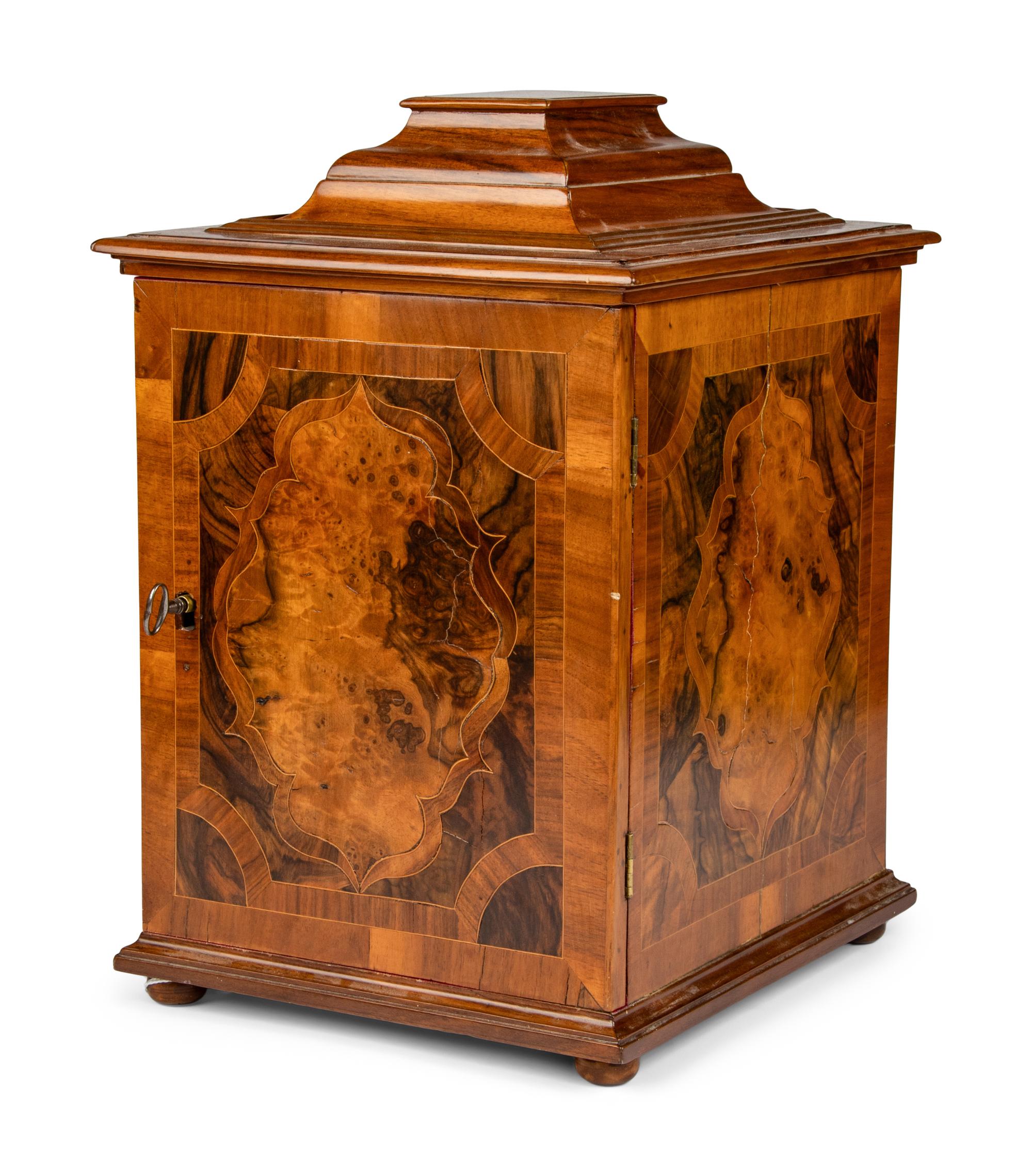 A Continental Walnut Collector's Cabinet