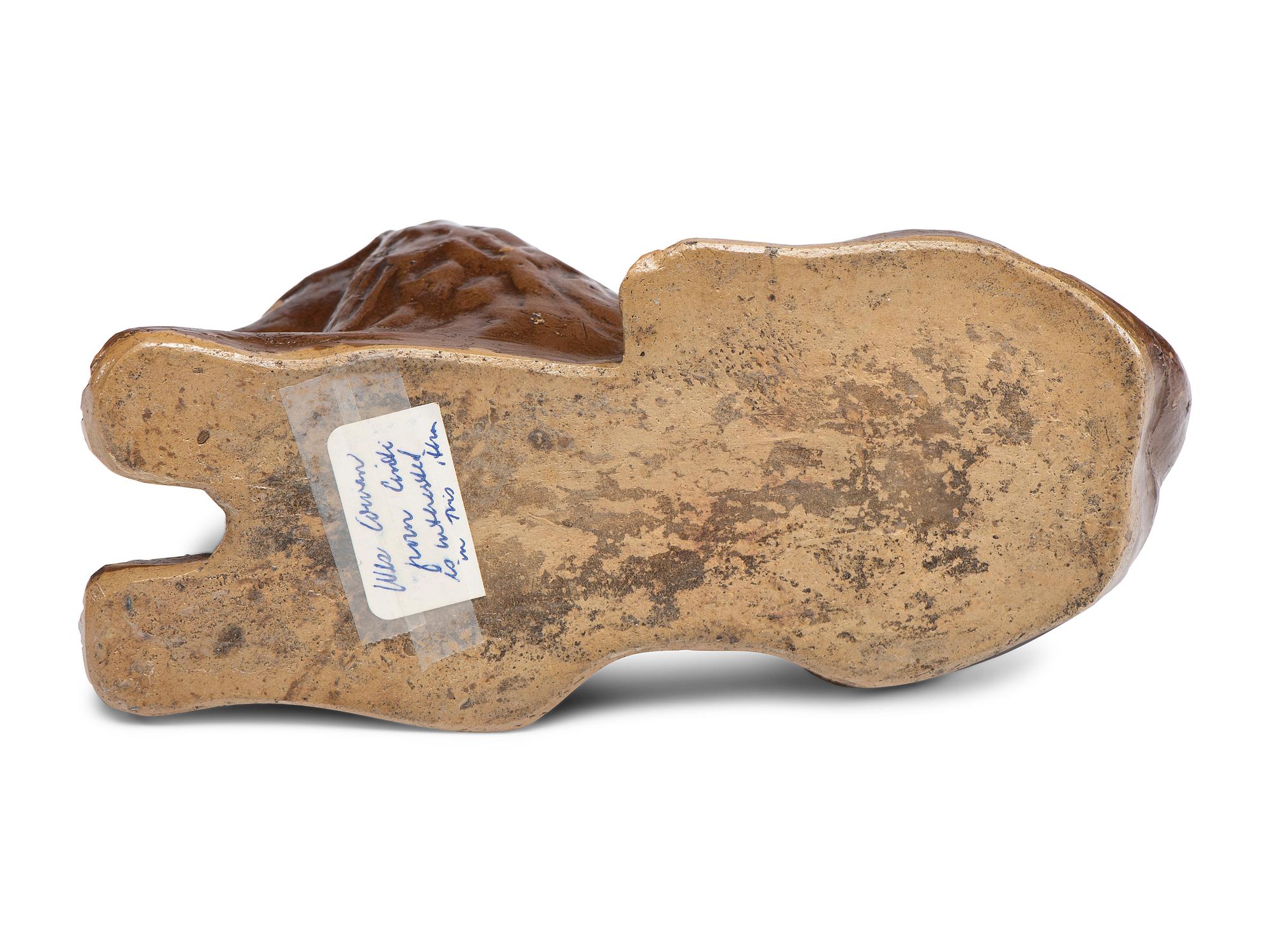 A Scarce Ohio Stoneware Recumbent Lion Bank