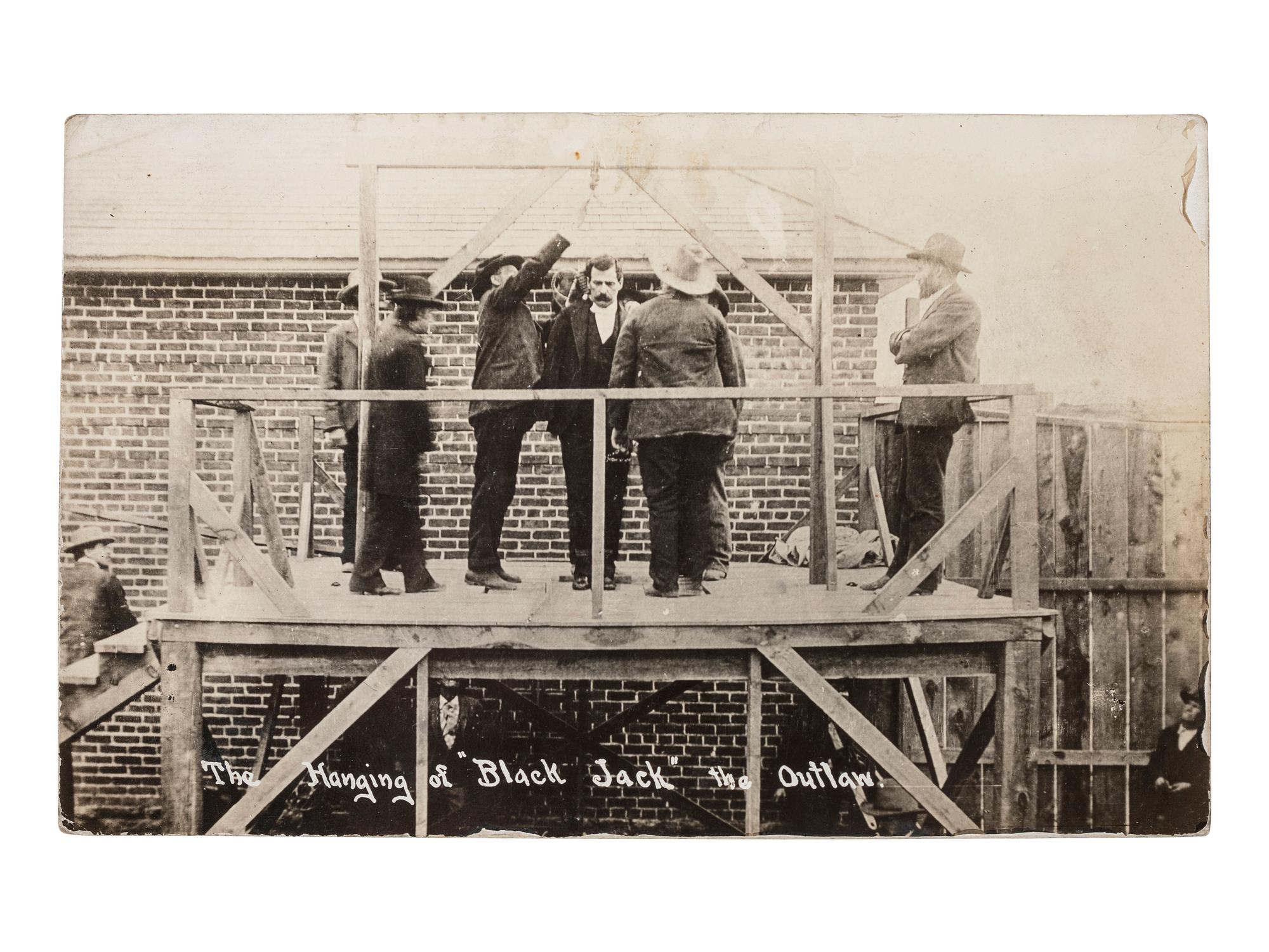 [OUTLAWS]. A pair of real photo postcards showing the hanging of Thomas Edward "Black Jack" Ketchum. [April 1901].