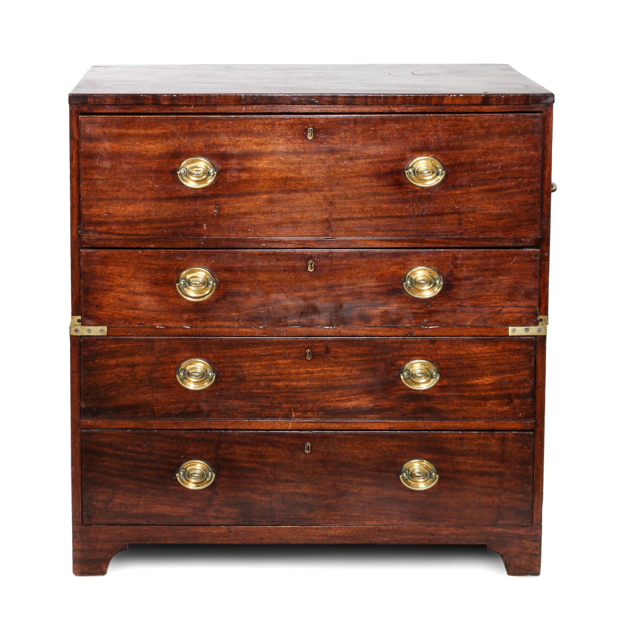 A Campaign Style Mahogany Secretaire Chest of Drawers Height 39 1/2 x width 38 x depth 20 inches — CIRCA 1910